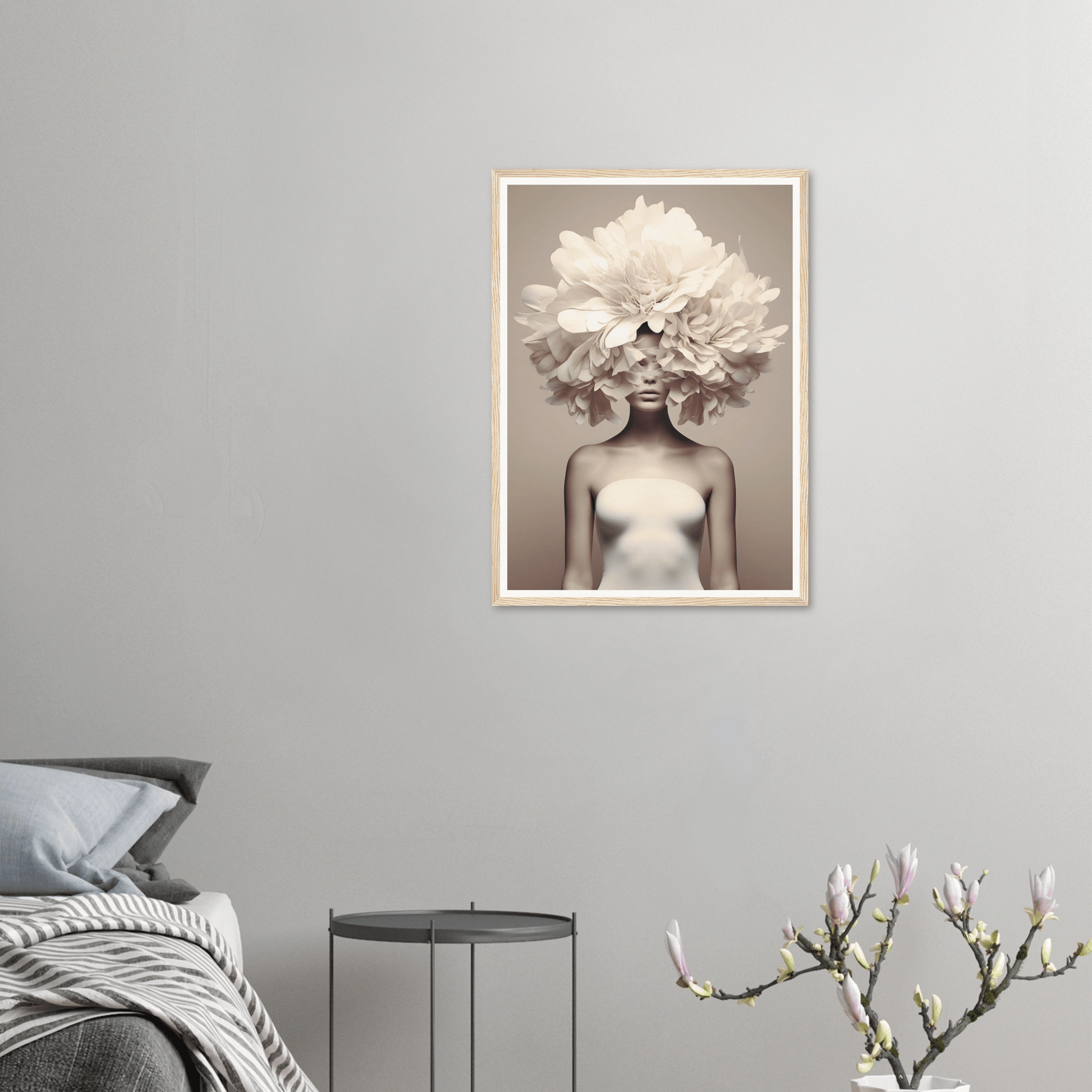 Framed artistic photograph of a figure with a large white flower arrangement obscuring the head.