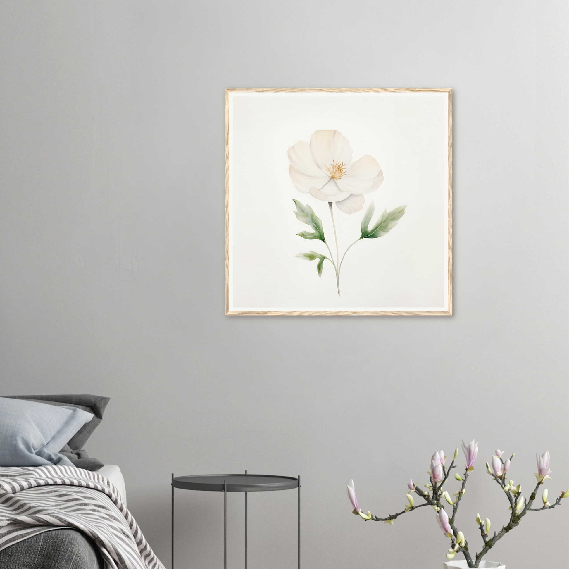 Framed watercolor painting of a delicate white flower with green leaves.