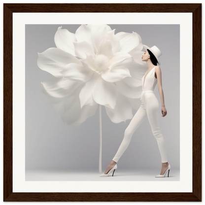 Woman in white attire walking beside an oversized white flower.