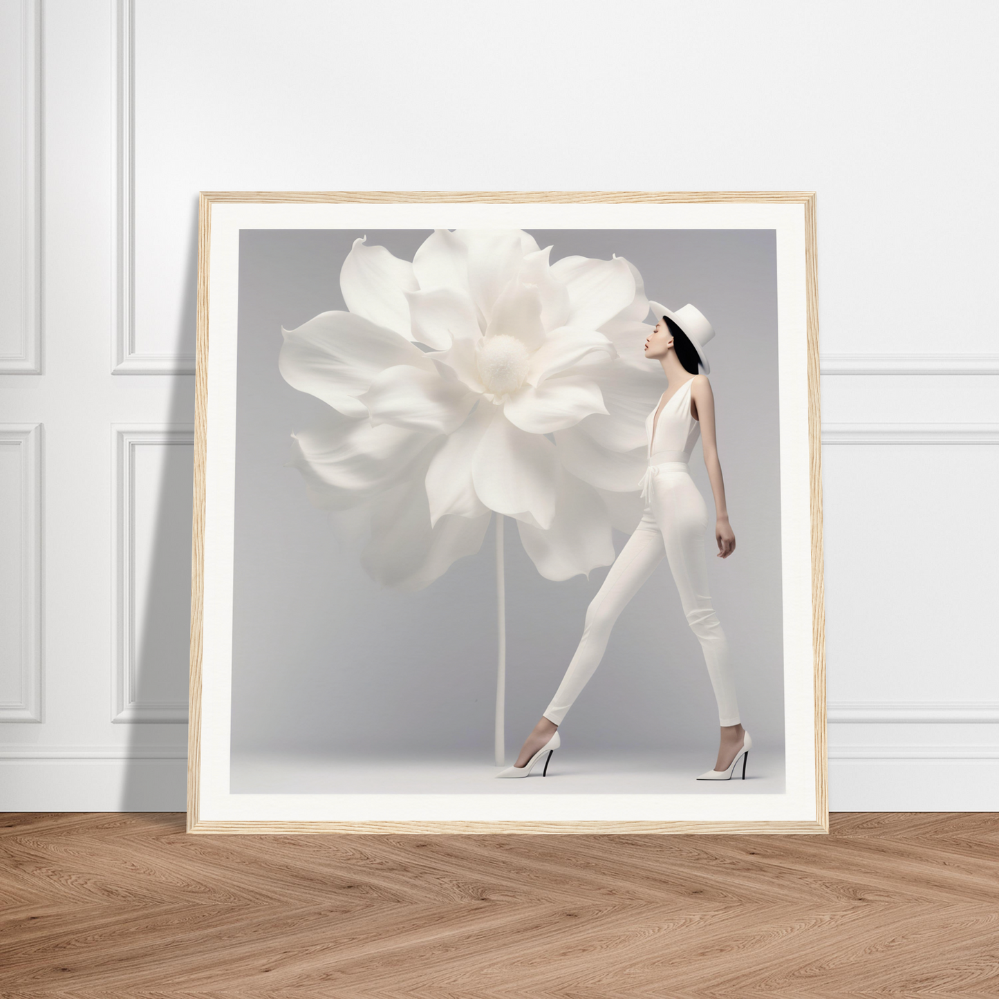 Framed photograph of a woman in white walking past an oversized white flower.