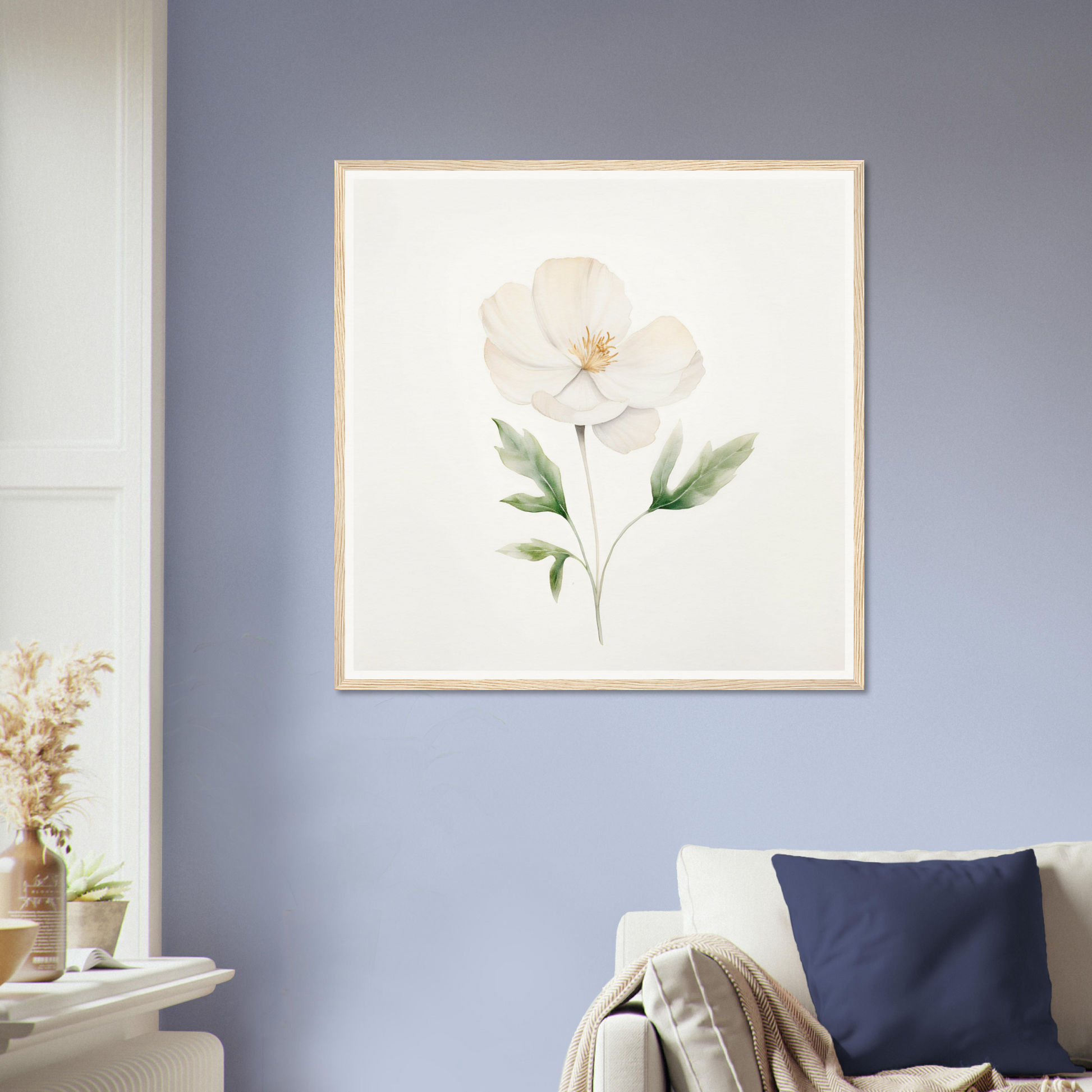 Framed watercolor painting of a single white flower with green leaves.