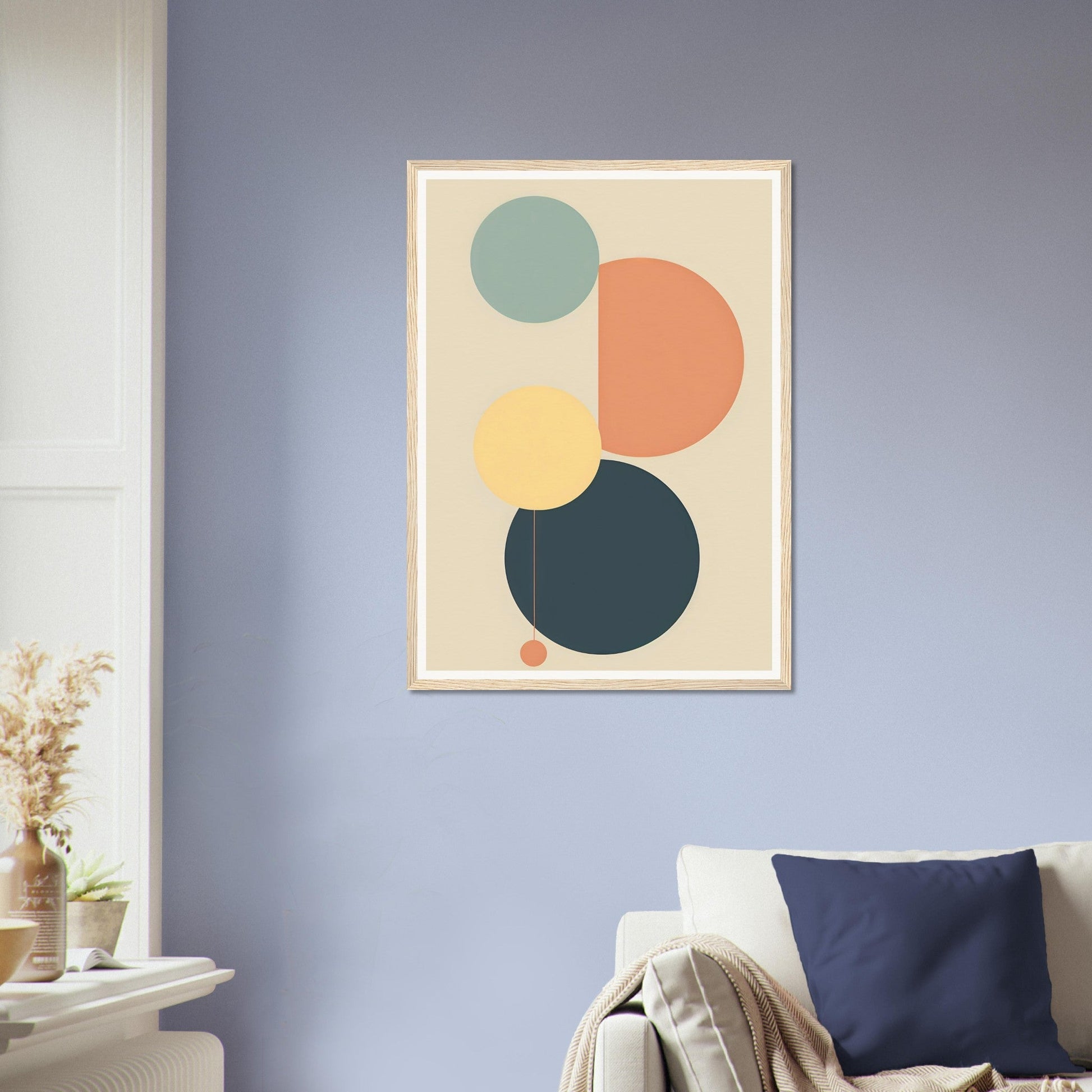 Abstract geometric artwork featuring overlapping circles in muted colors.