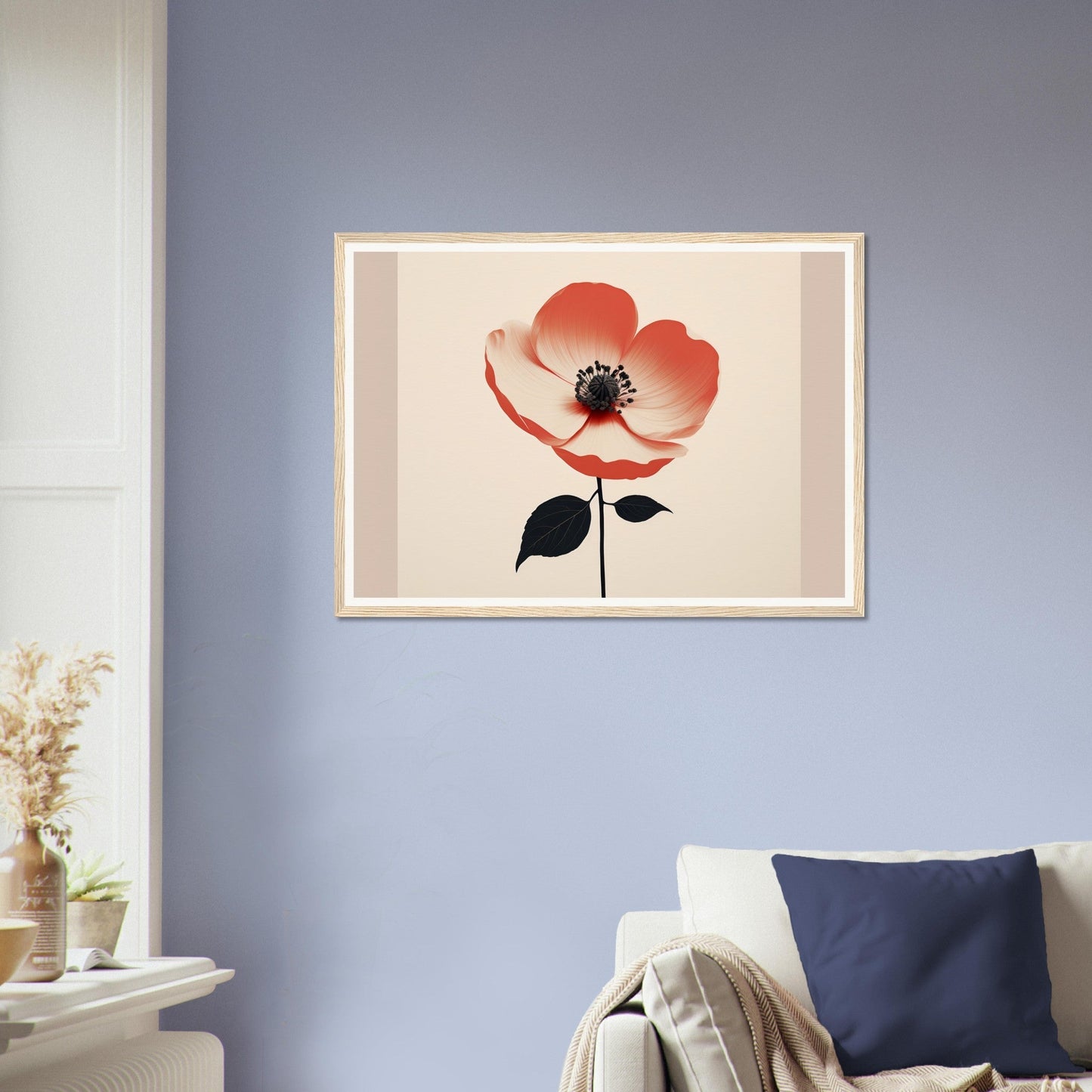 Framed artwork depicting a single red poppy flower with black center and leaves.