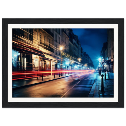 A framed photograph of a london street at night