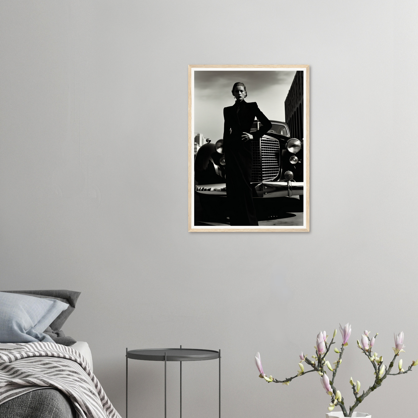 A framed photograph of a man leaning on a car