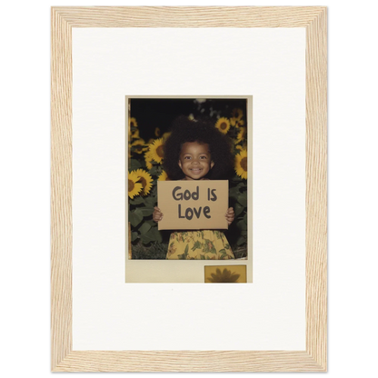 Framed canvas print of a child with a God Is Love sign and sunflowers for room decoration