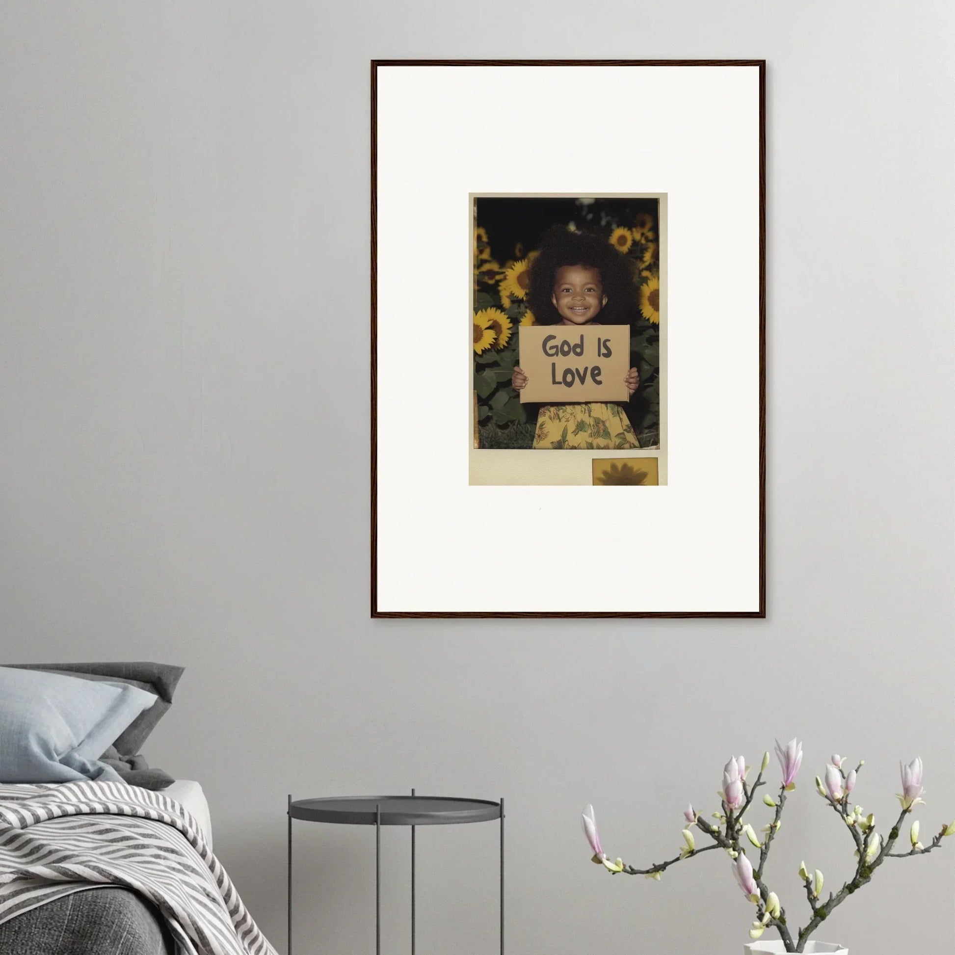 Framed wall art of a child with God is Love sign and sunflowers for room decoration