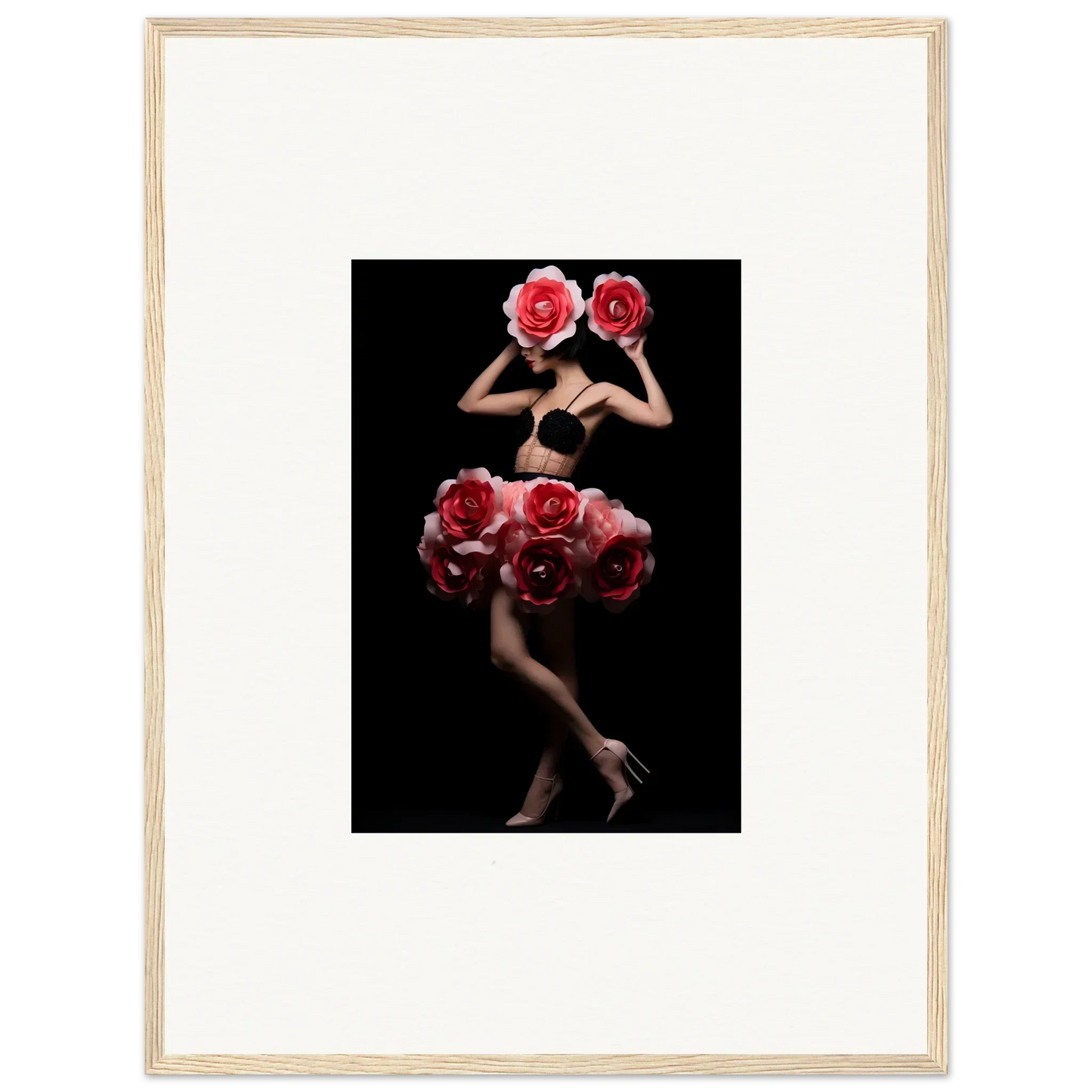 Artistic photograph of a figure adorned with vibrant red roses against a black background.