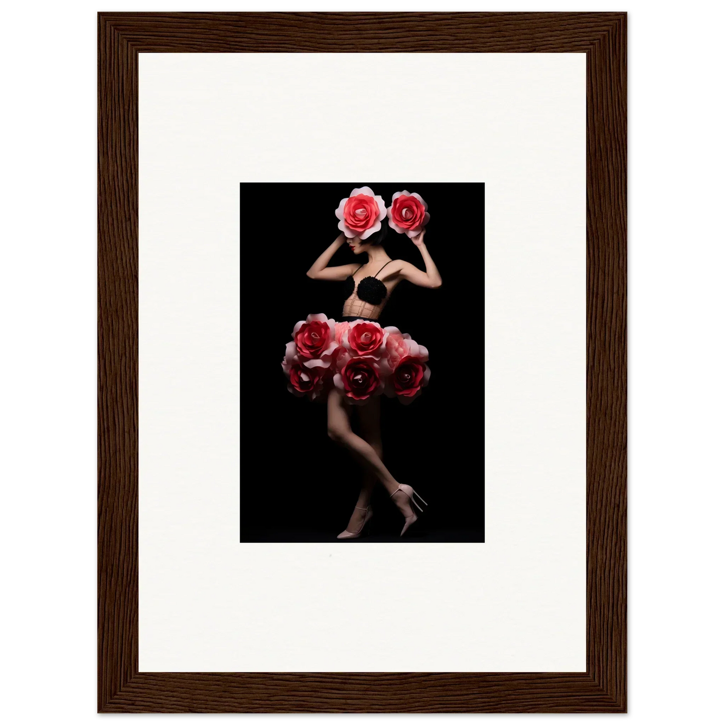 Framed artistic photograph of a figure adorned with vibrant red roses against a dark background.