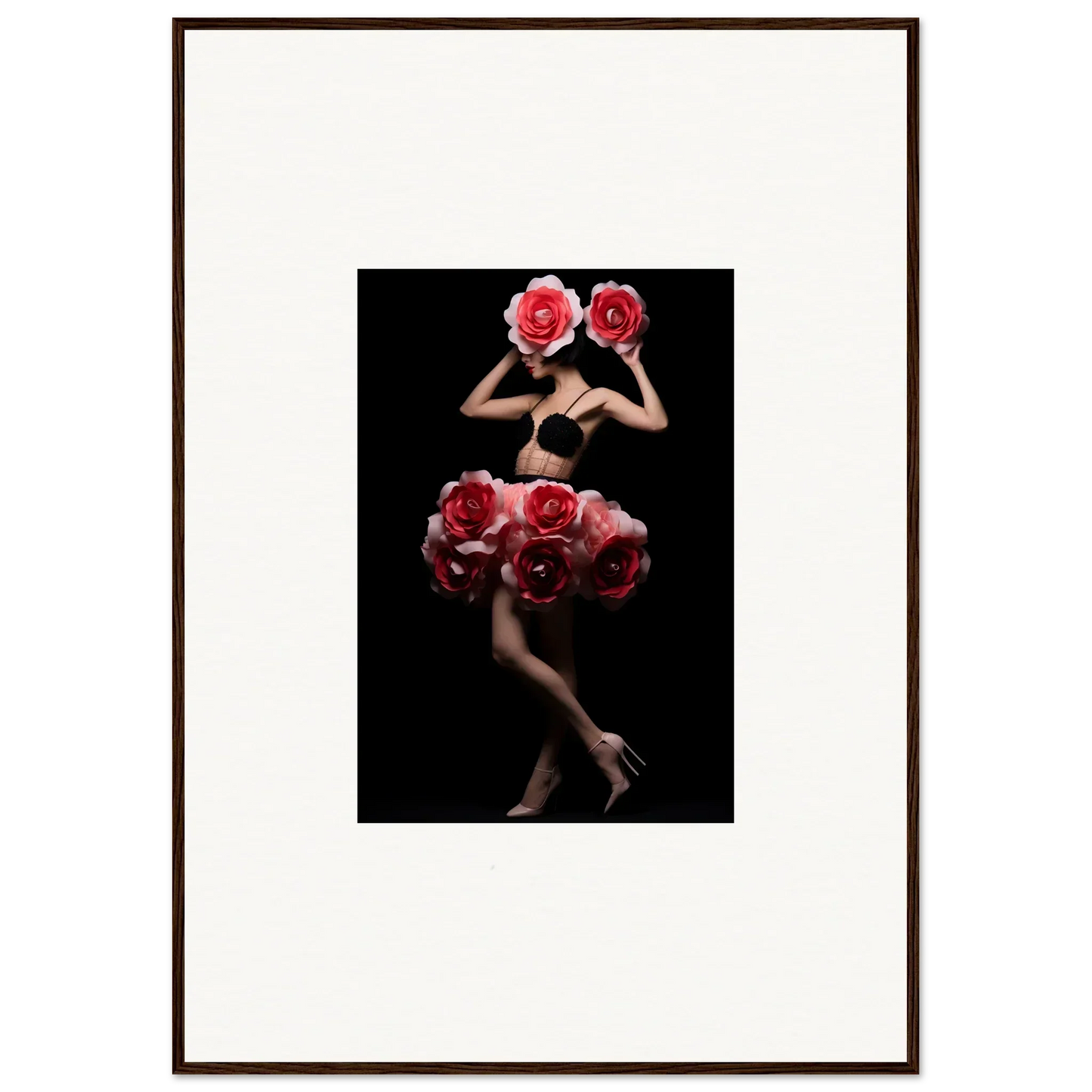 Framed artistic photograph of a figure adorned with vibrant red roses against a dark background.