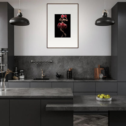 Modern, sleek kitchen with dark cabinetry and a striking framed artwork on the wall.