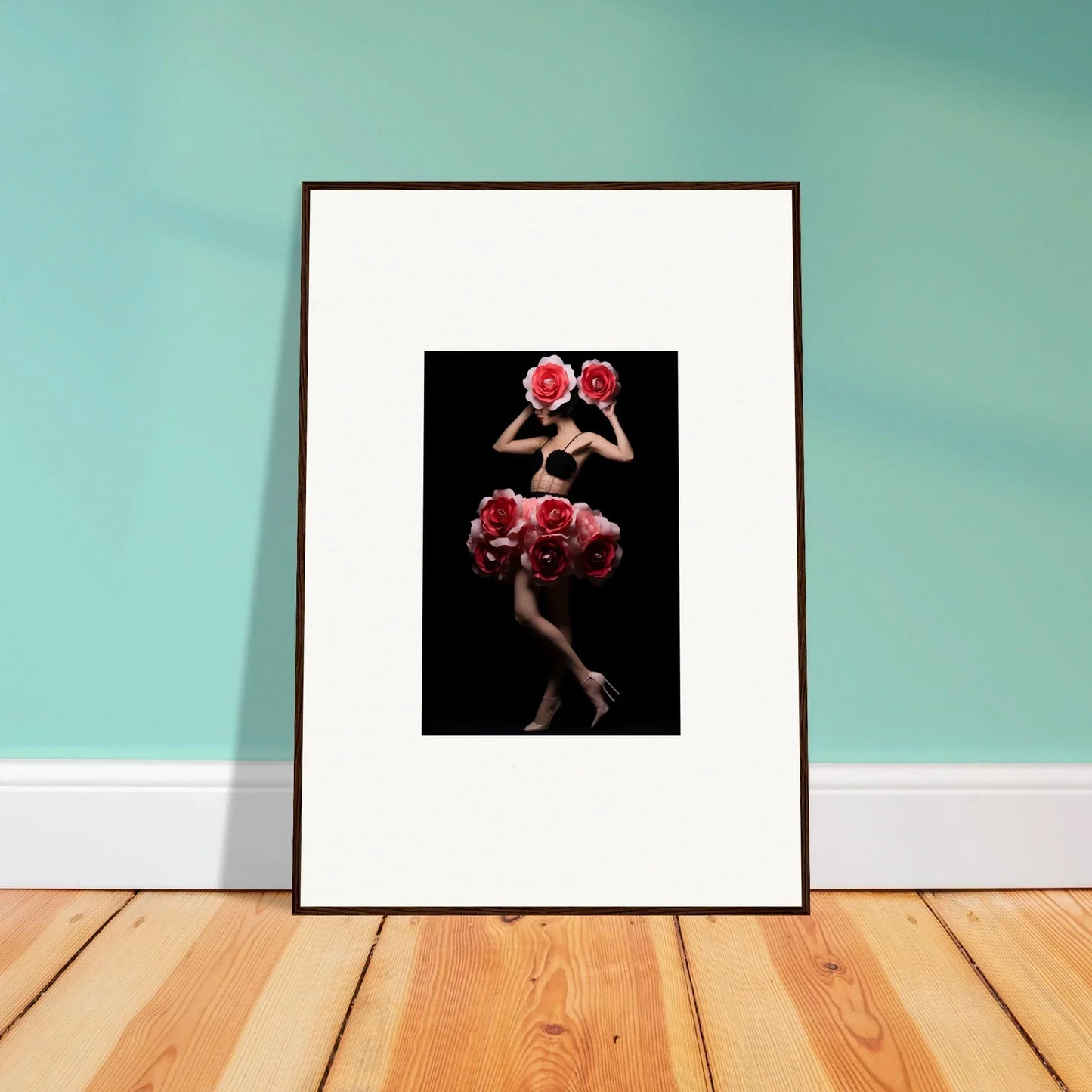 Framed artwork depicting a figure in a dramatic red floral dress against a dark background.