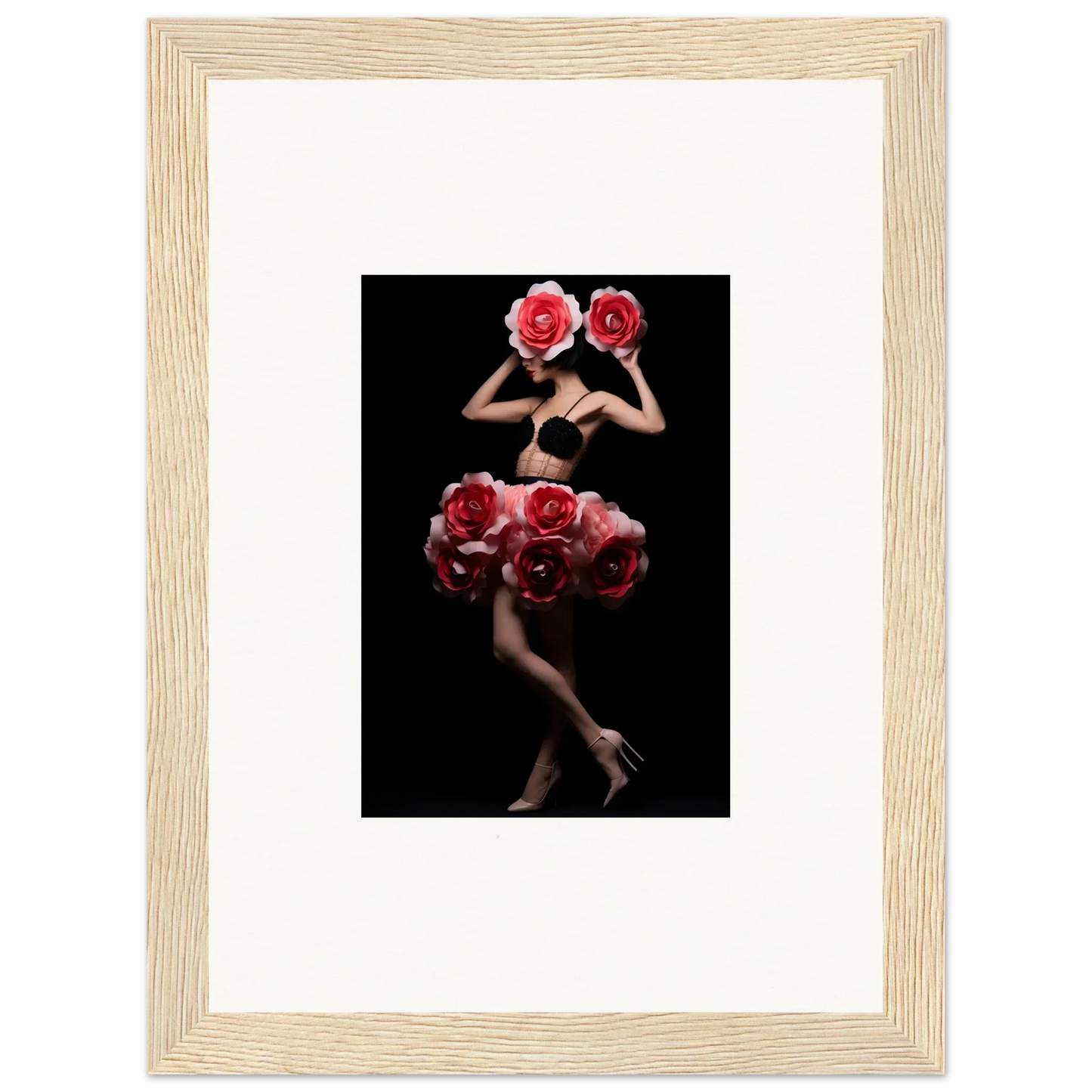 Framed artistic photograph of a figure adorned with vibrant red roses against a dark background.