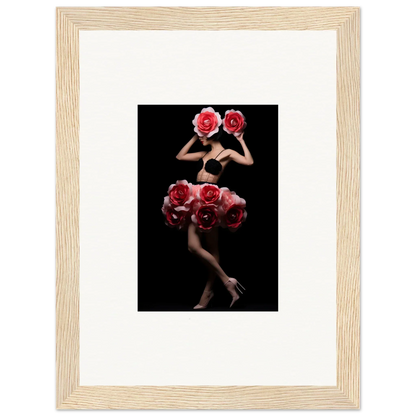 Framed artistic photograph of a figure adorned with vibrant red roses against a dark background.