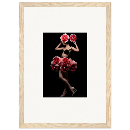 Framed artistic photograph of a figure holding red roses against a dark background.