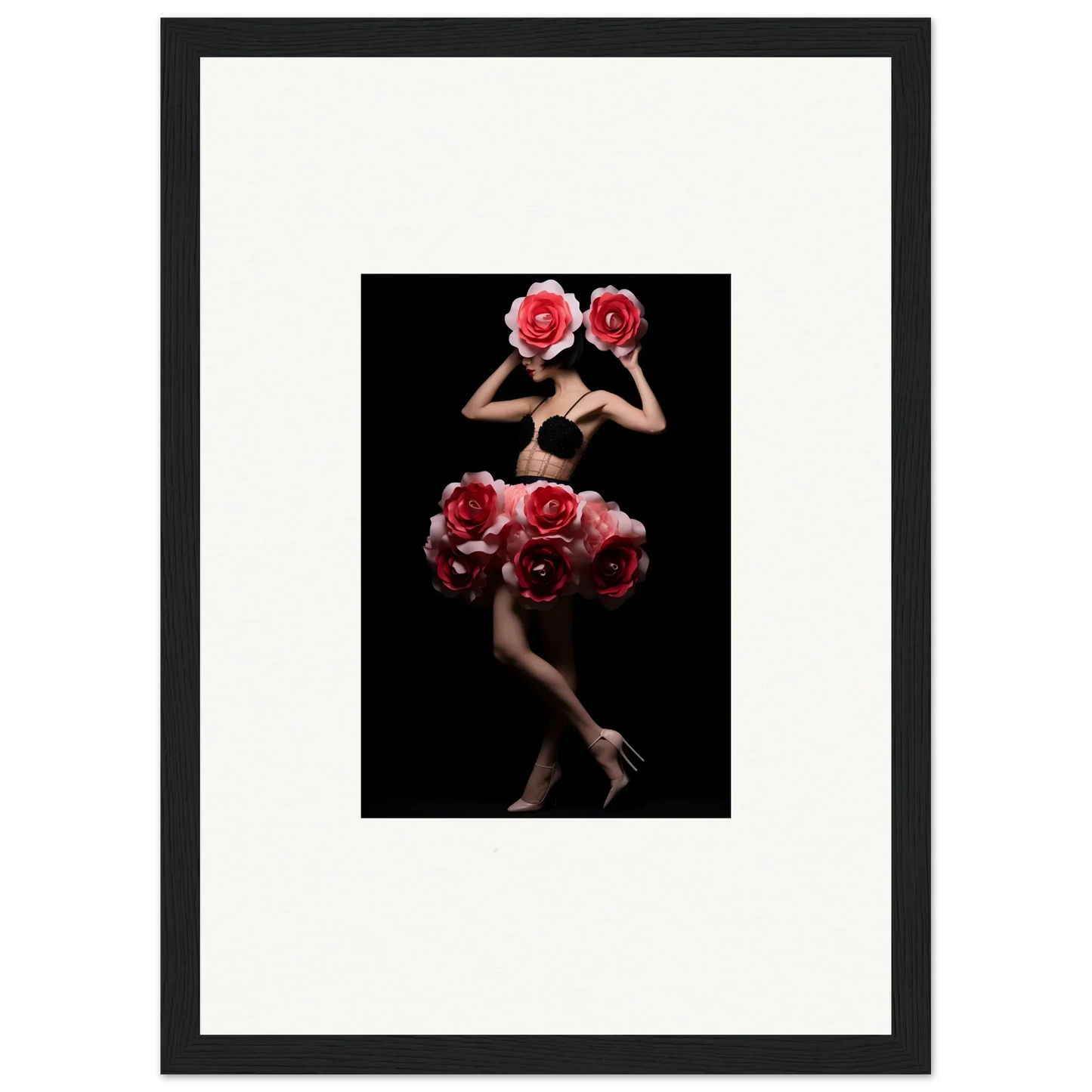 Artistic photograph of a nude figure holding large red roses, obscuring their face and body.