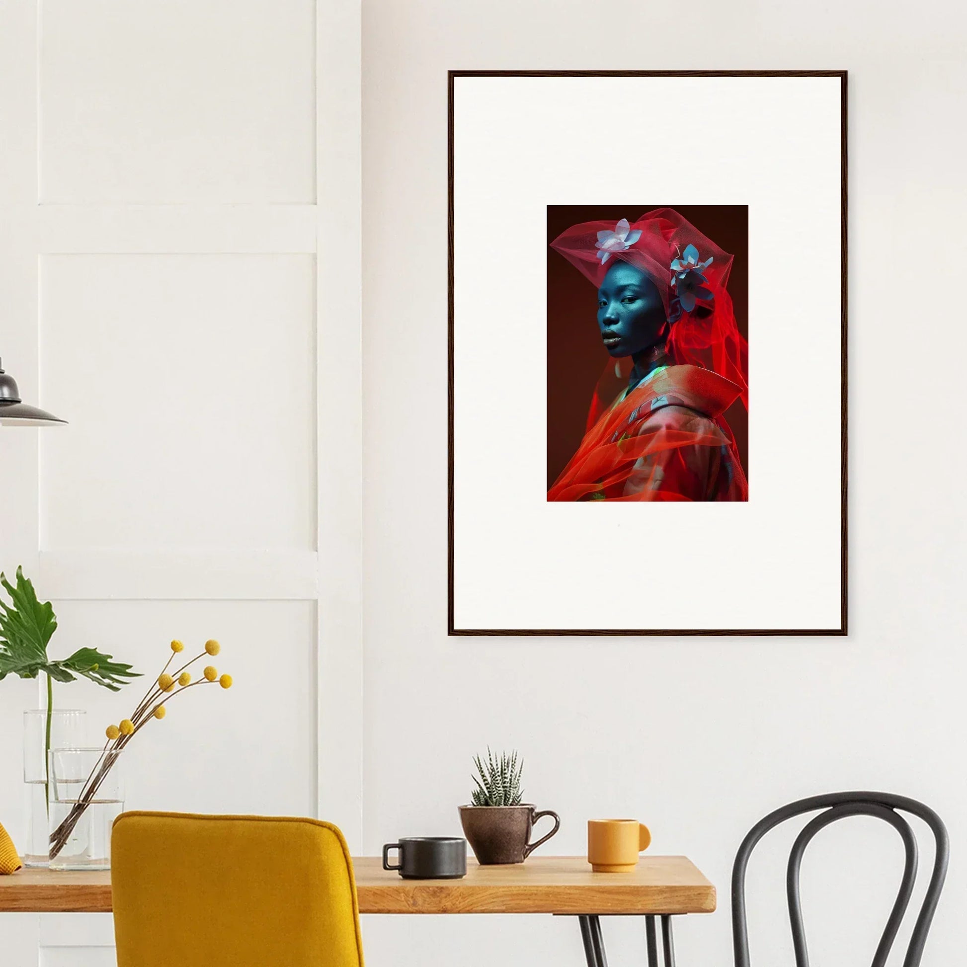 Framed canvas print of a person with vibrant blue and red for unique room decoration