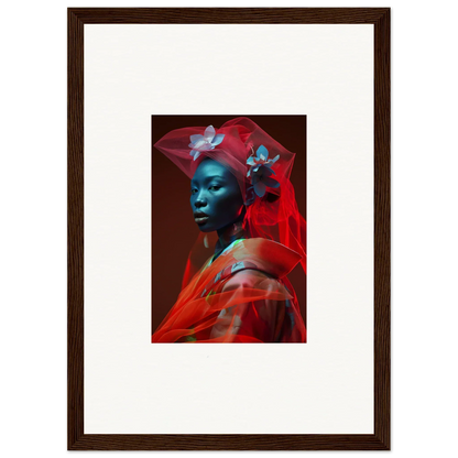 Framed canvas print of a person with blue-tinted skin wrapped in red fabric, perfect room decoration