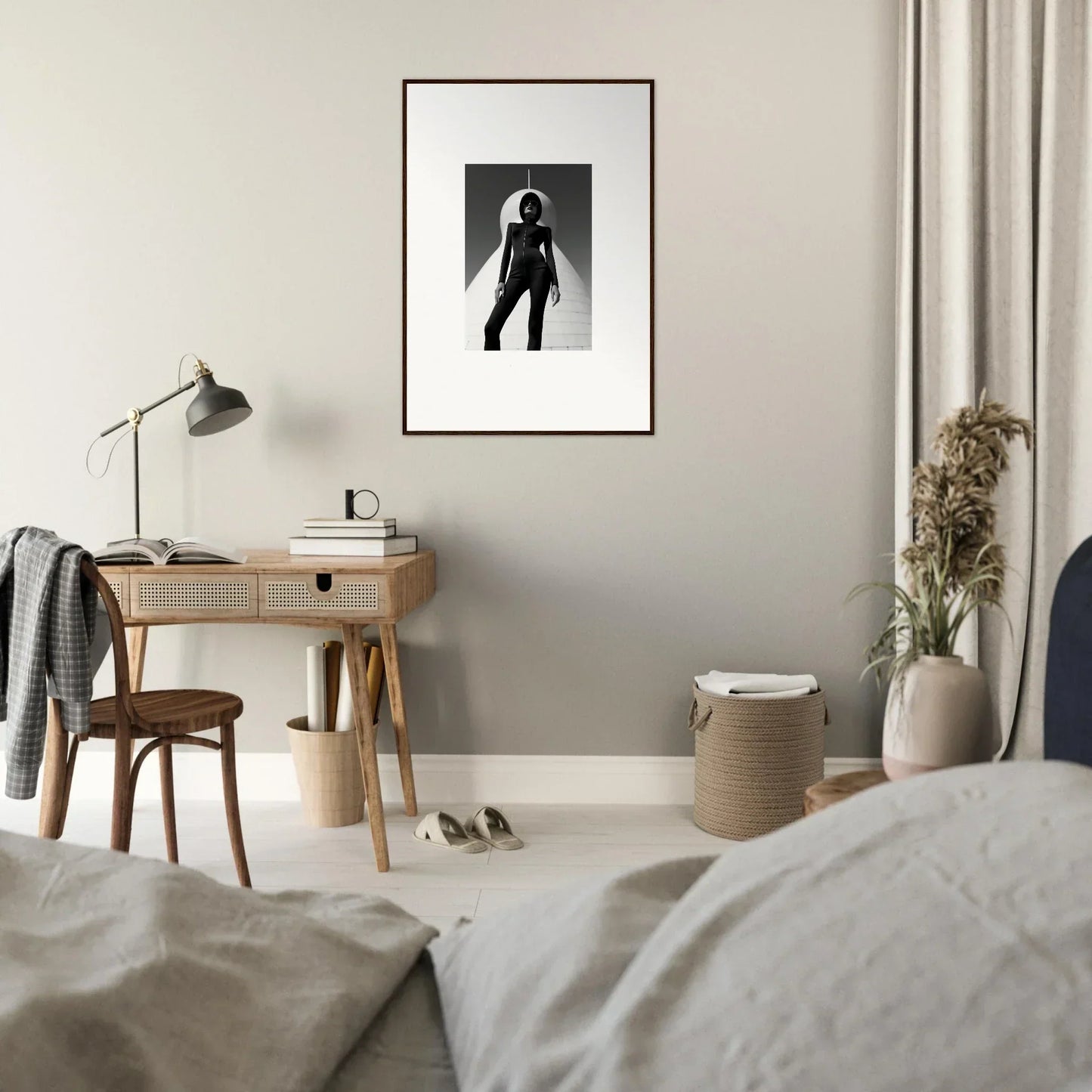 Framed black and white wall art of a person in dynamic pose for room decor