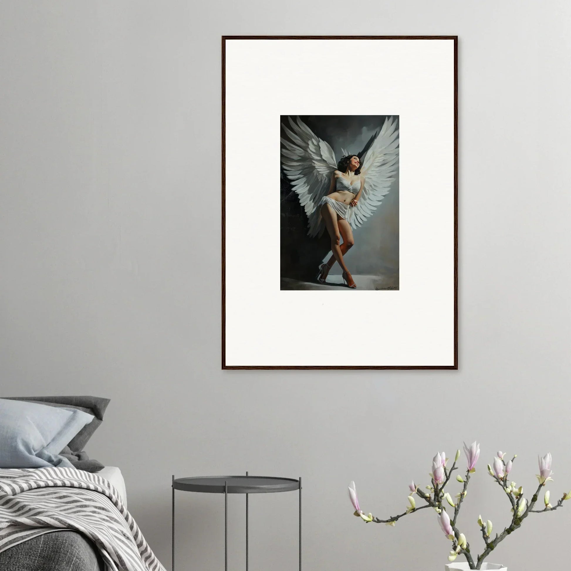 Framed wall art of a dynamic figure with outstretched wings for unique room decoration