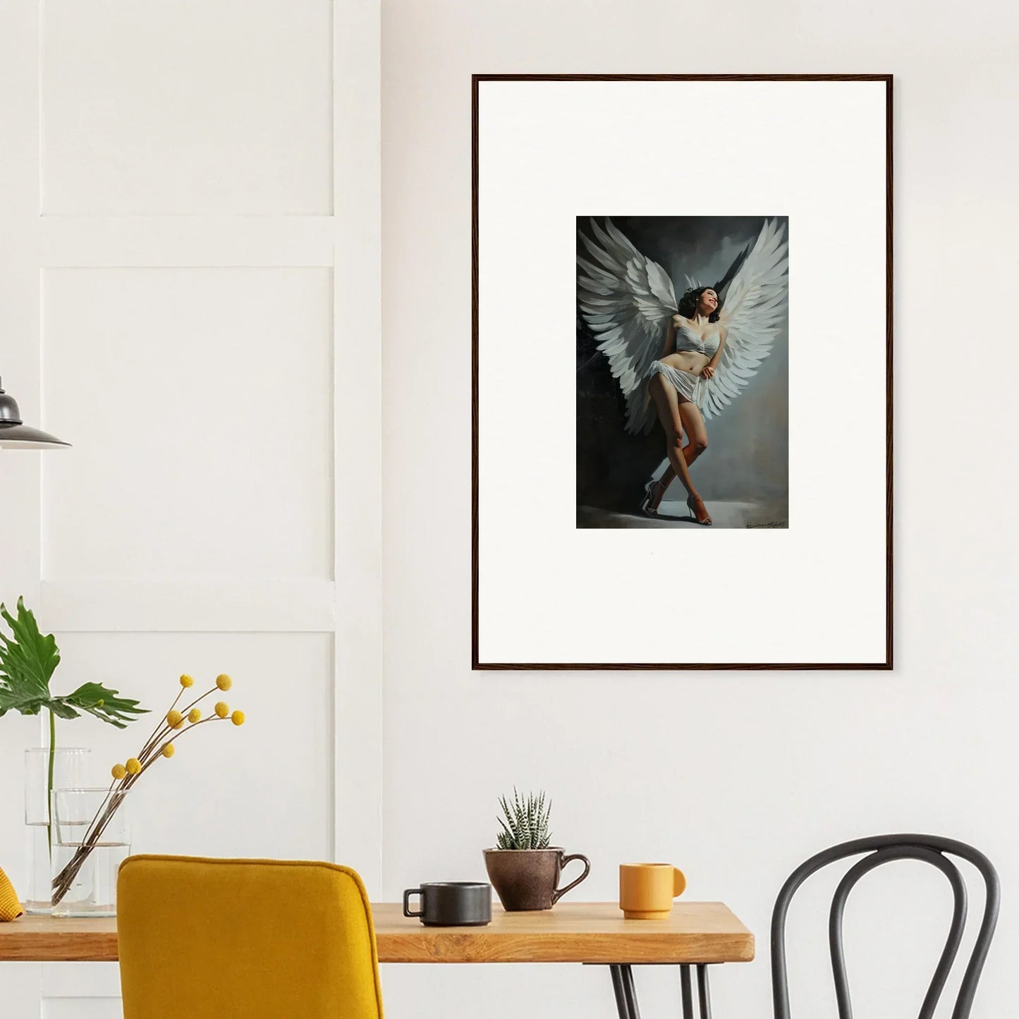 Framed wall art of a dancer with white wings, perfect for unique room decoration