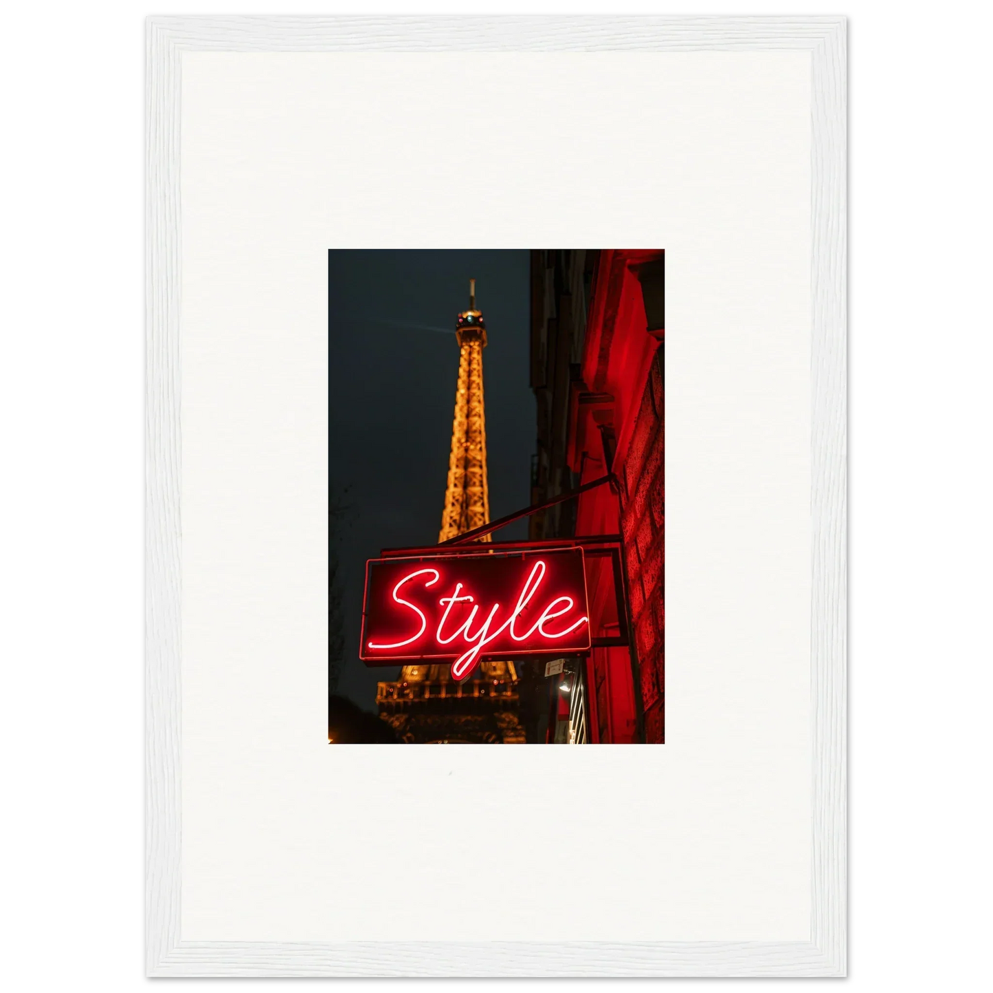 Framed photograph of the Eiffel Tower at night, perfect for room decoration or wall art