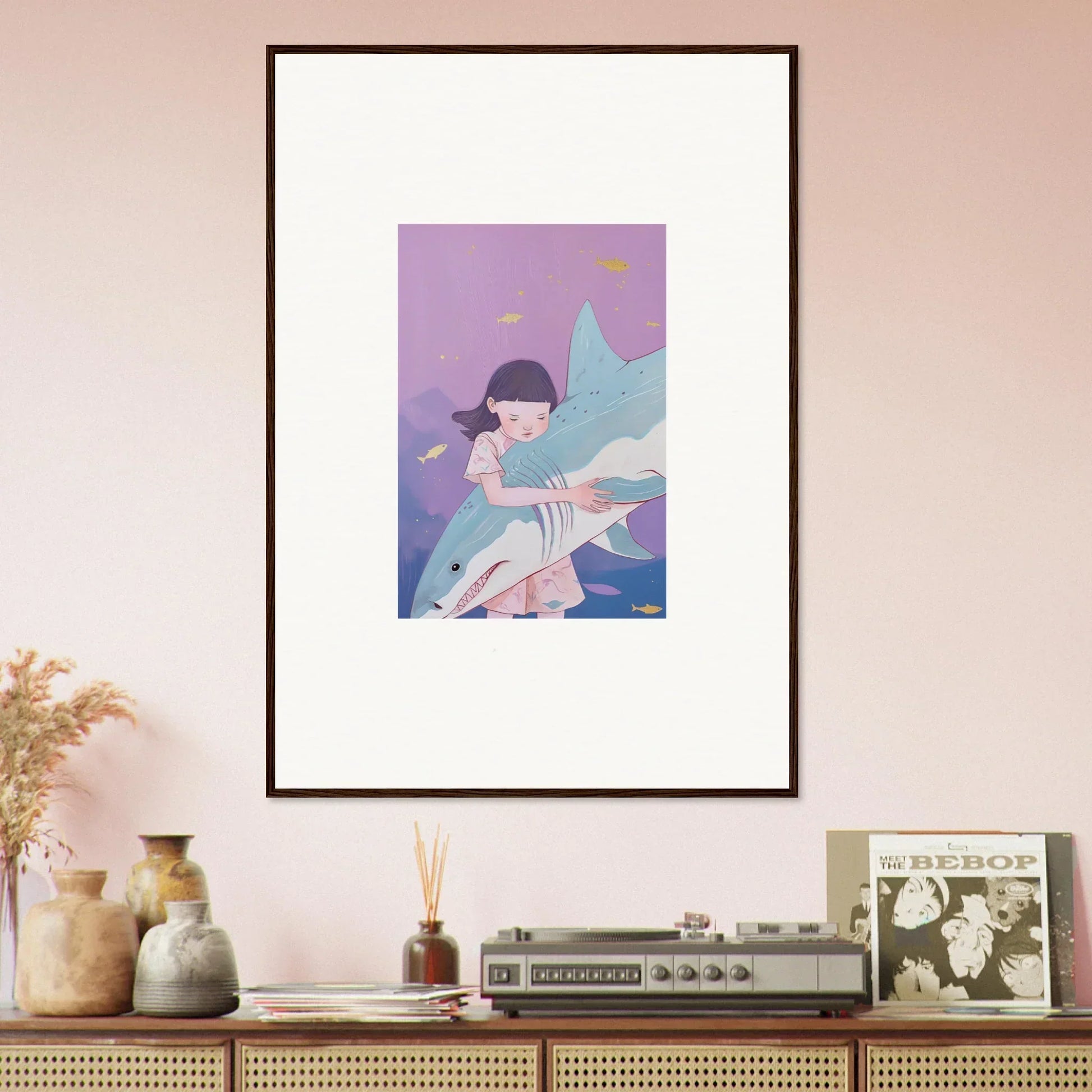 Framed canvas print of a girl with blue wings and a fish for whimsical room decoration