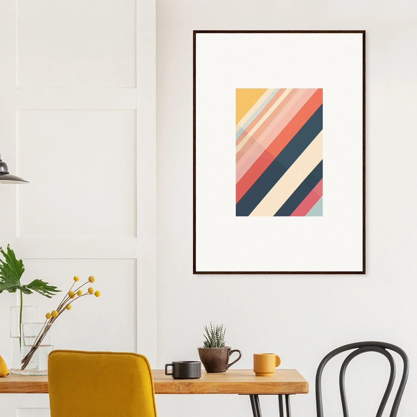 Framed wall art with diagonal stripes in warm and cool colors for vibrant room decor