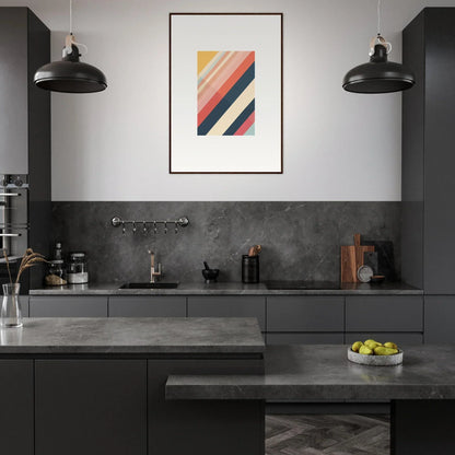 Modern kitchen showcasing dark cabinetry, concrete countertops, and framed wall art for essence shift