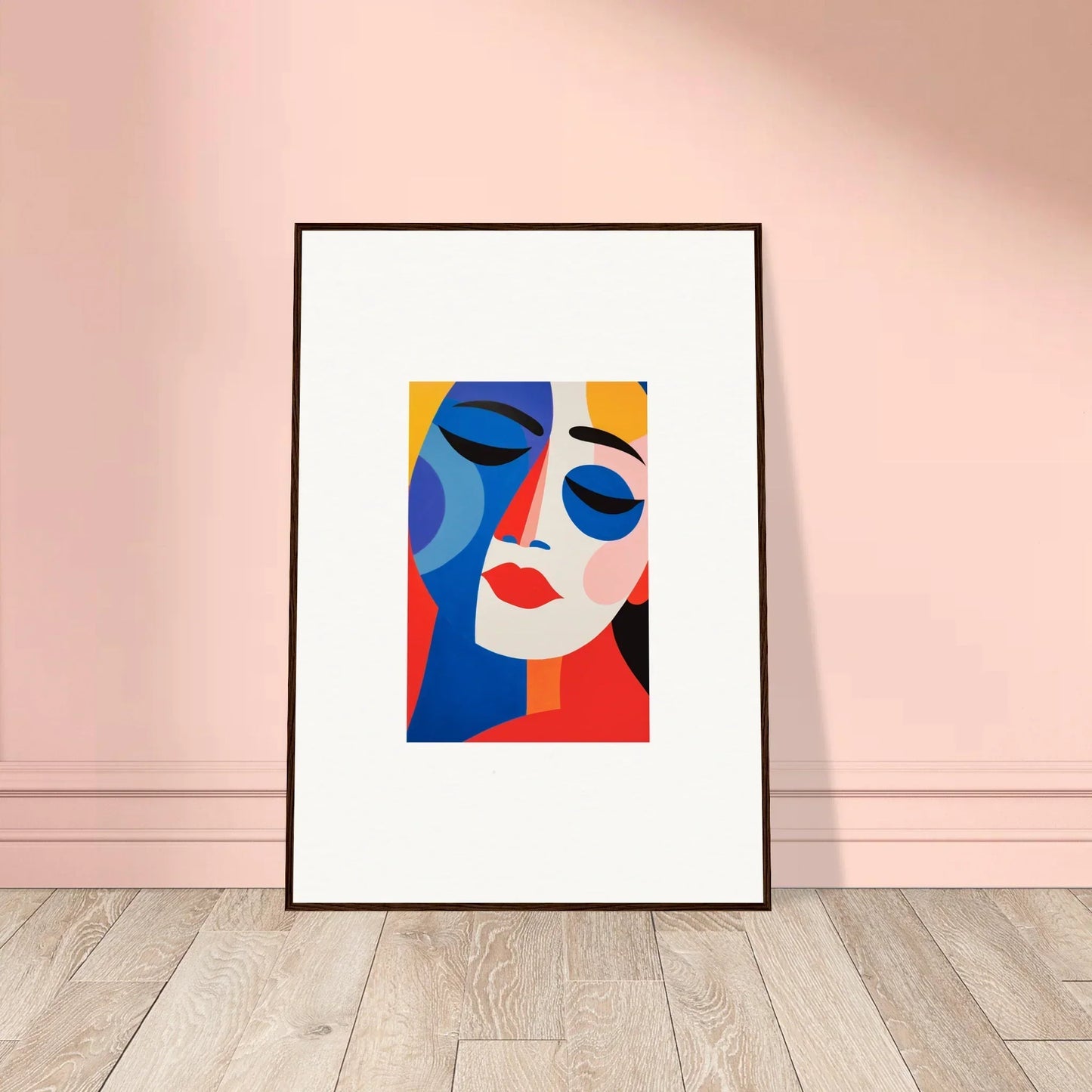 Framed wall art with colorful geometric shapes creating a colors reverie face design