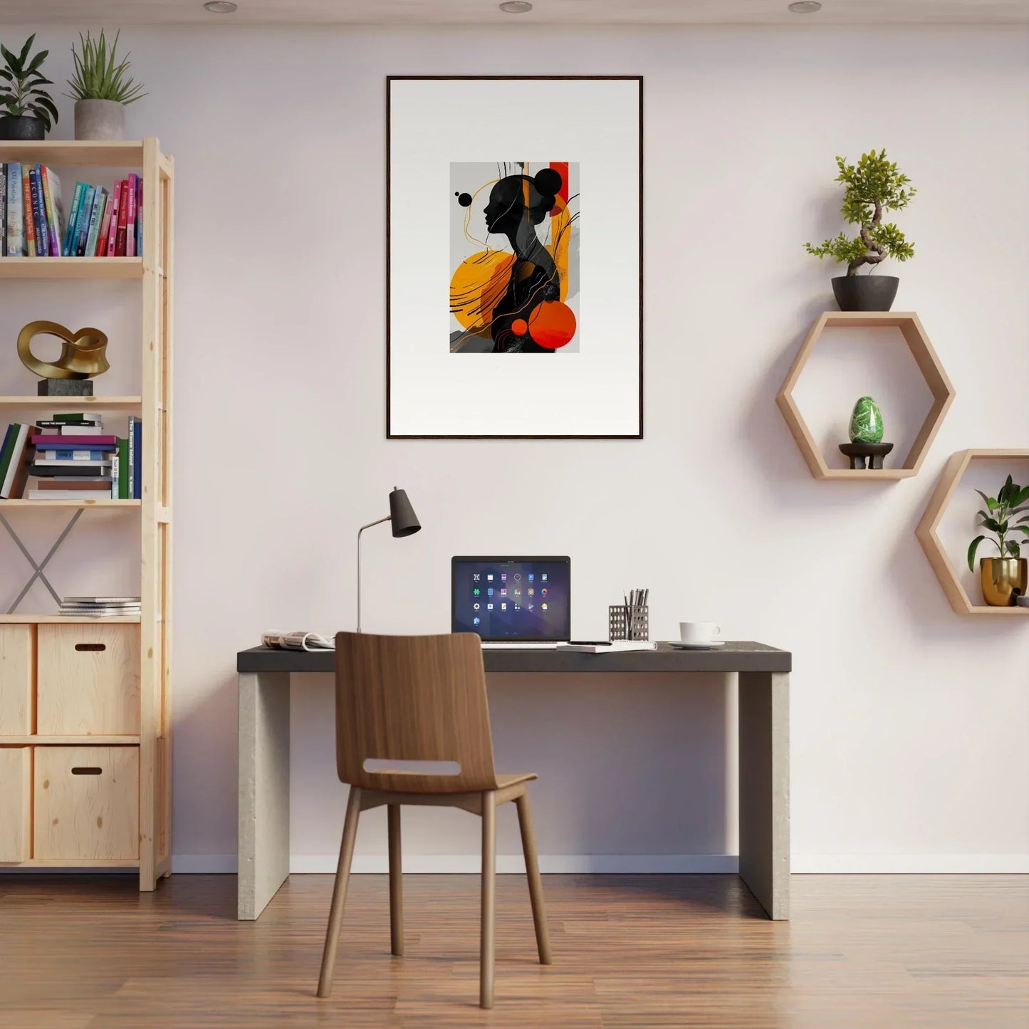 Modern home office workspace featuring desk, chair, and stylish framed wall art