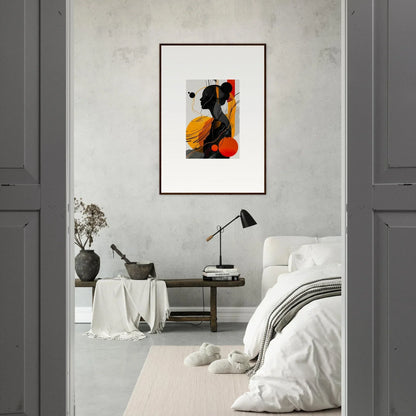 Framed wall art featuring bold black, yellow, and red shapes for striking room decor