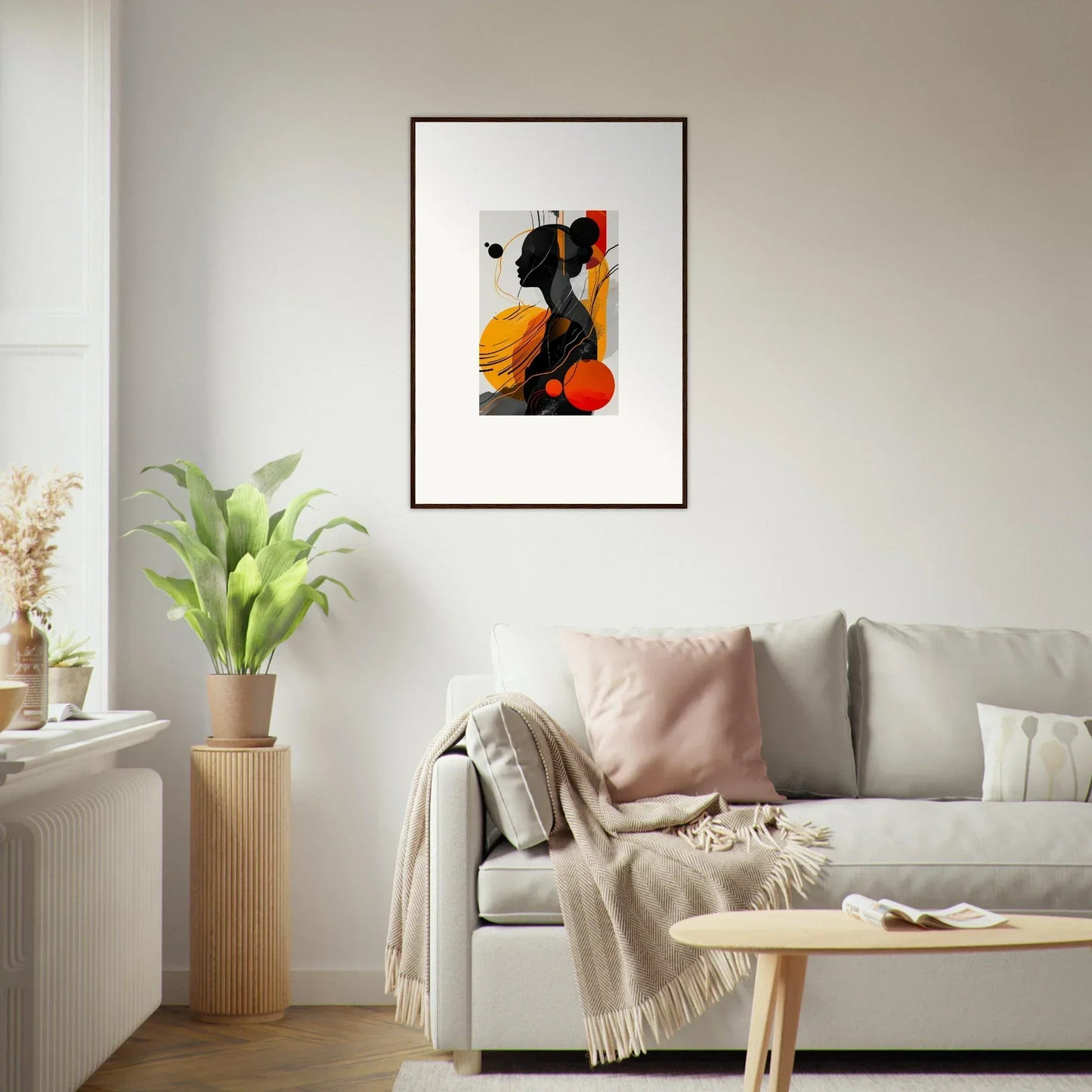 Abstract framed wall art with bold shapes in black, orange, and yellow for room decor