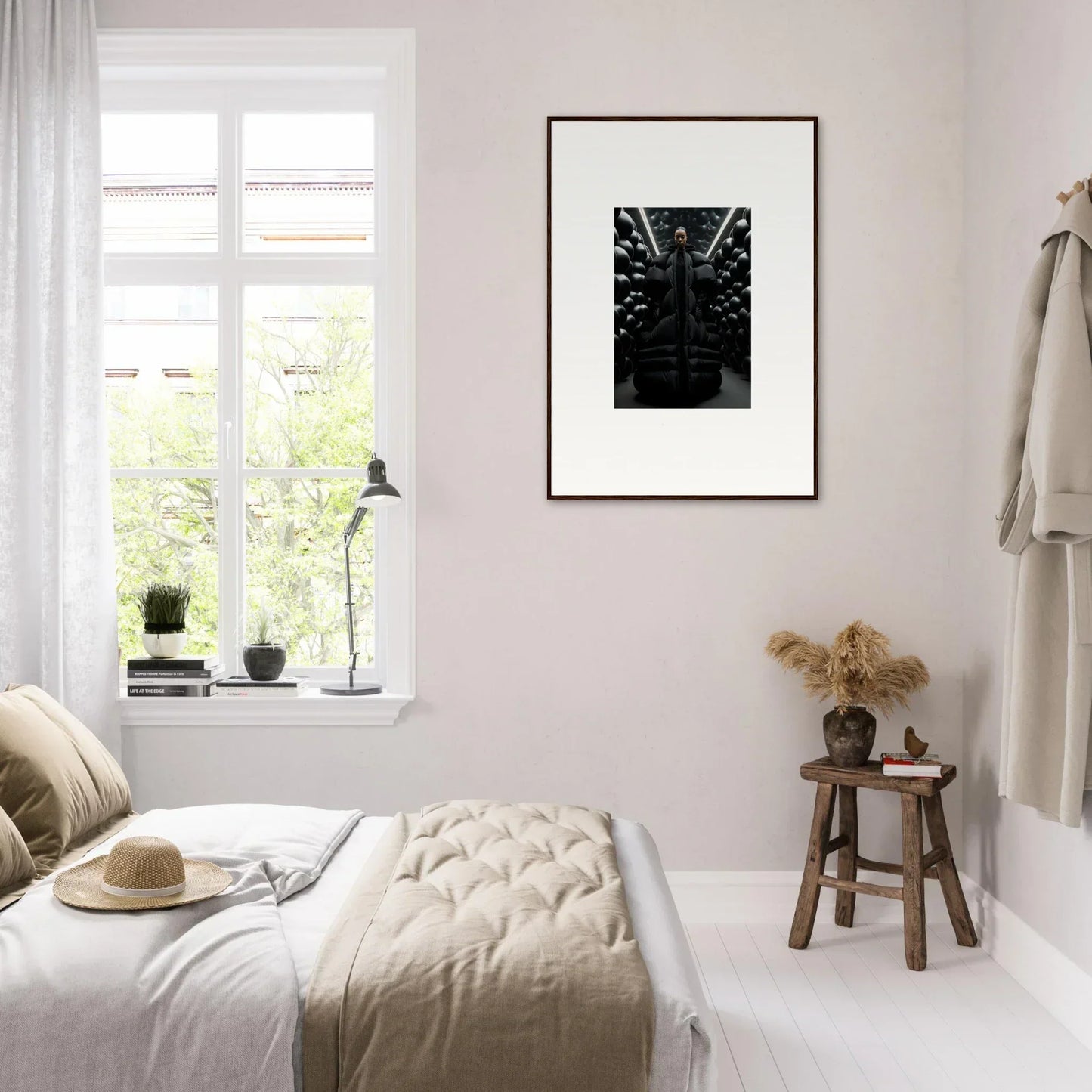 Bright, minimalist bedroom featuring a cozy bed and lunar echoes canvas print decor