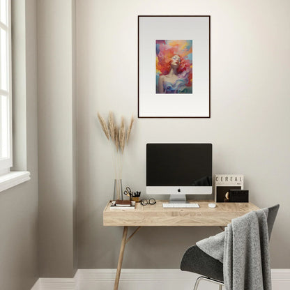 Minimalist wooden desk with computer monitor and framed wall art in stylish room decor