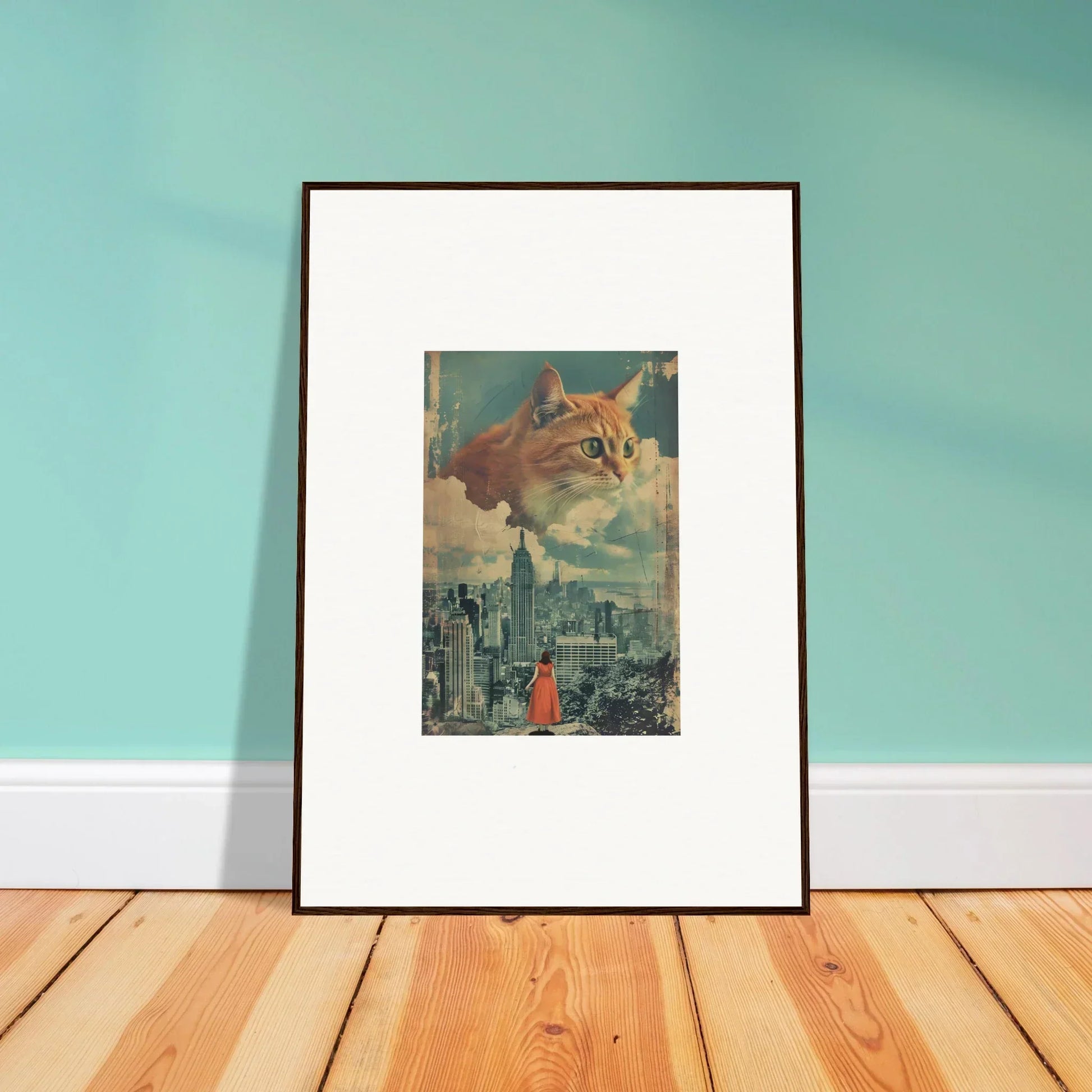 Framed wall art of surreal cat visions over a cityscape with a red figure