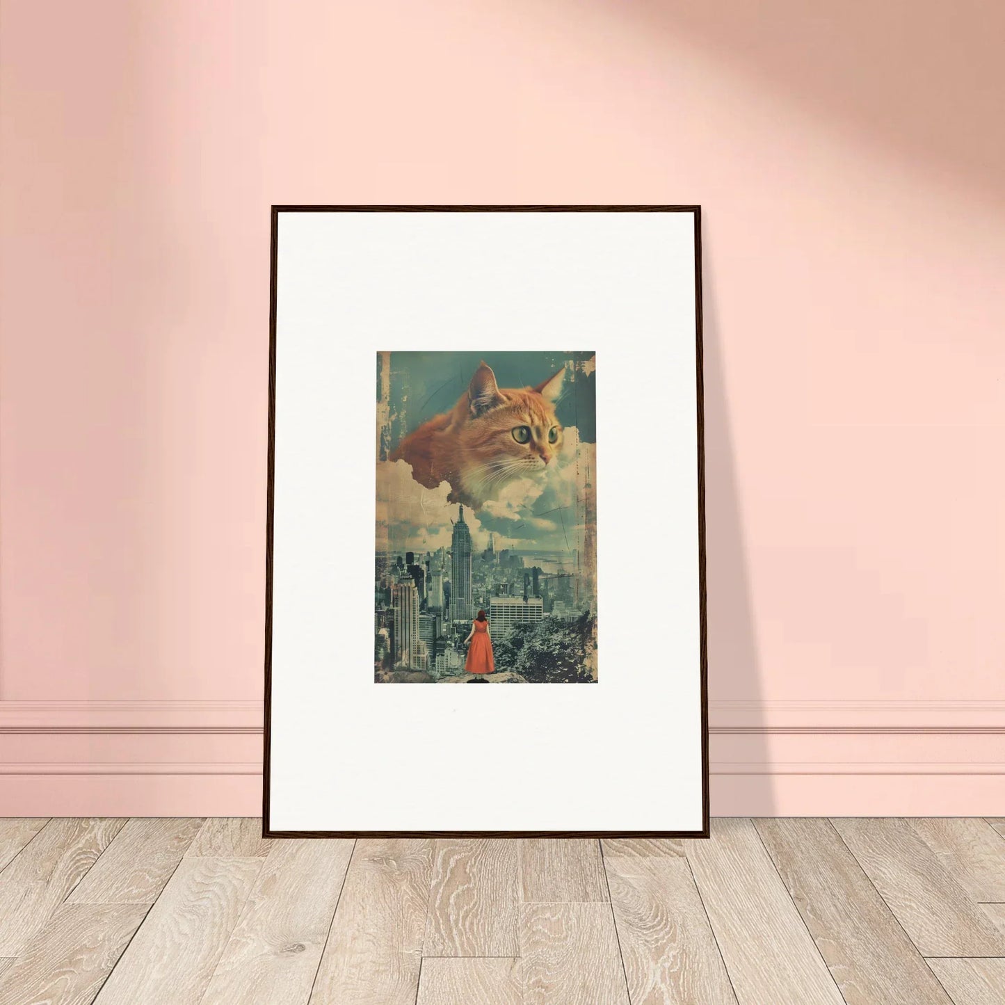 Framed wall art of a giant cat looming over a cityscape for unique room decor