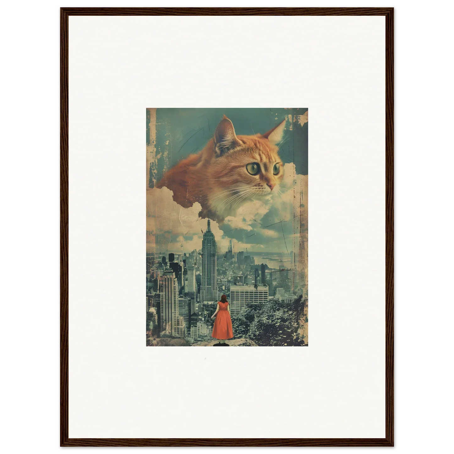 Framed surrealist wall art of a giant cat’s face over a cityscape, perfect for room decor