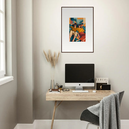 Minimalist home office with wood desk, computer, and Lovers Reve canvas print