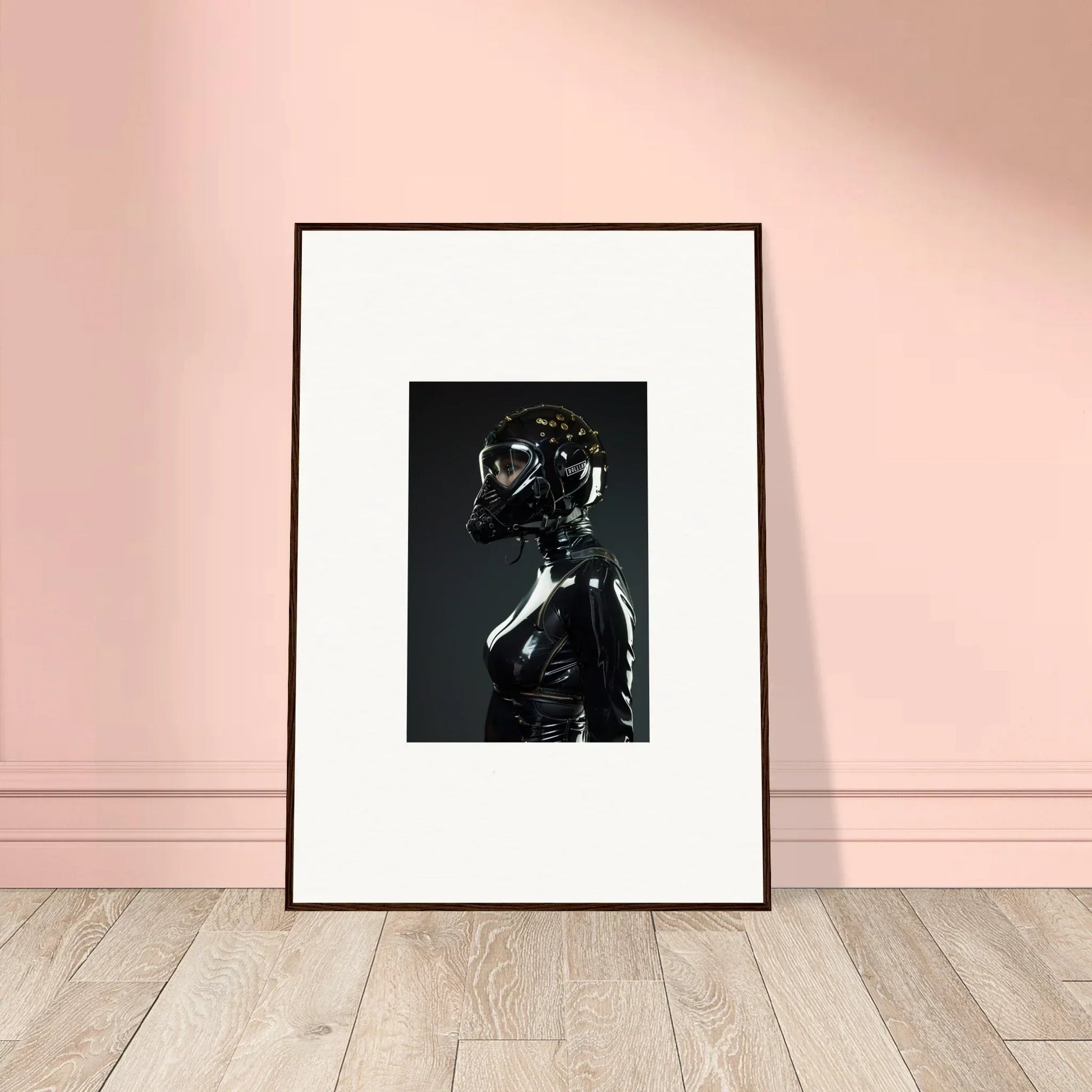 Framed black and white photograph of a figure in a shiny, futuristic outfit with a reflective helmet.