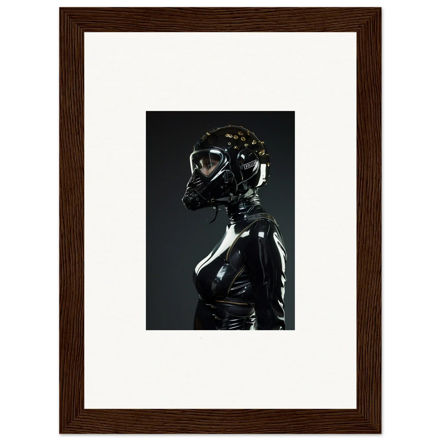 Framed photograph of a figure in shiny black latex or rubber attire with a matching mask or helmet.