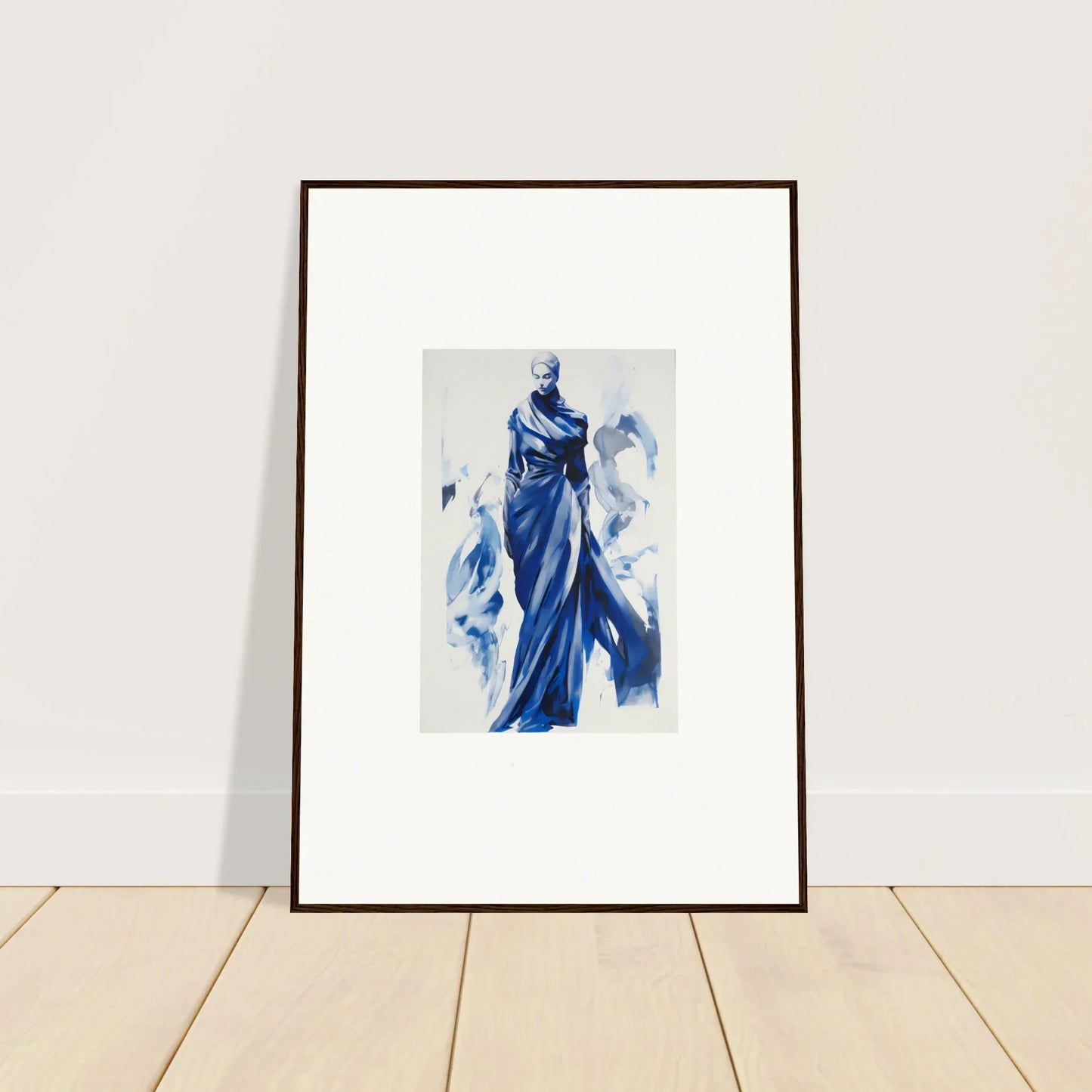 Framed wall art of a figure in flowing blue robes for the Cosmic Mood Cloaked collection