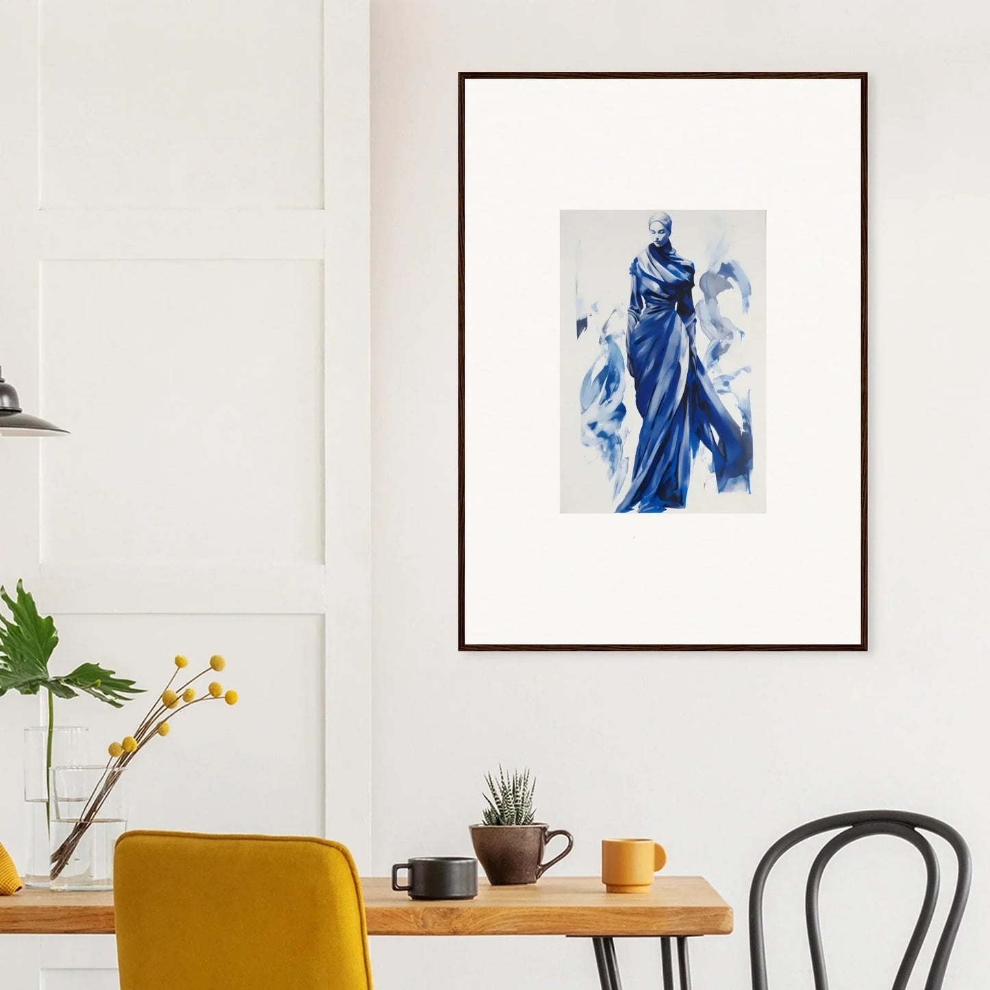 Framed wall art featuring a figure in flowing blue robes from Cosmic Mood Cloaked