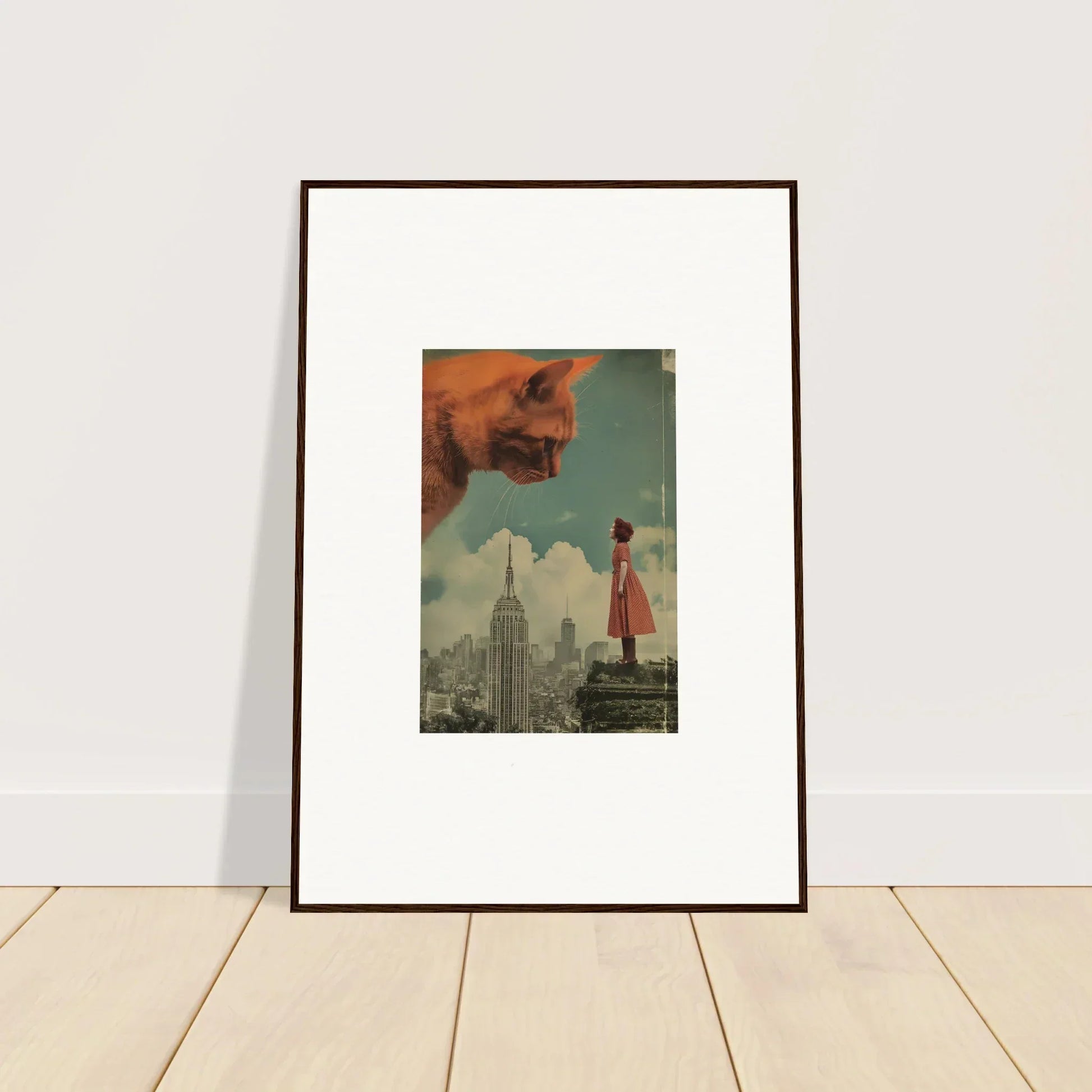 Framed surrealist wall art featuring a giant cat head over a cityscape for whimsy glance room decor