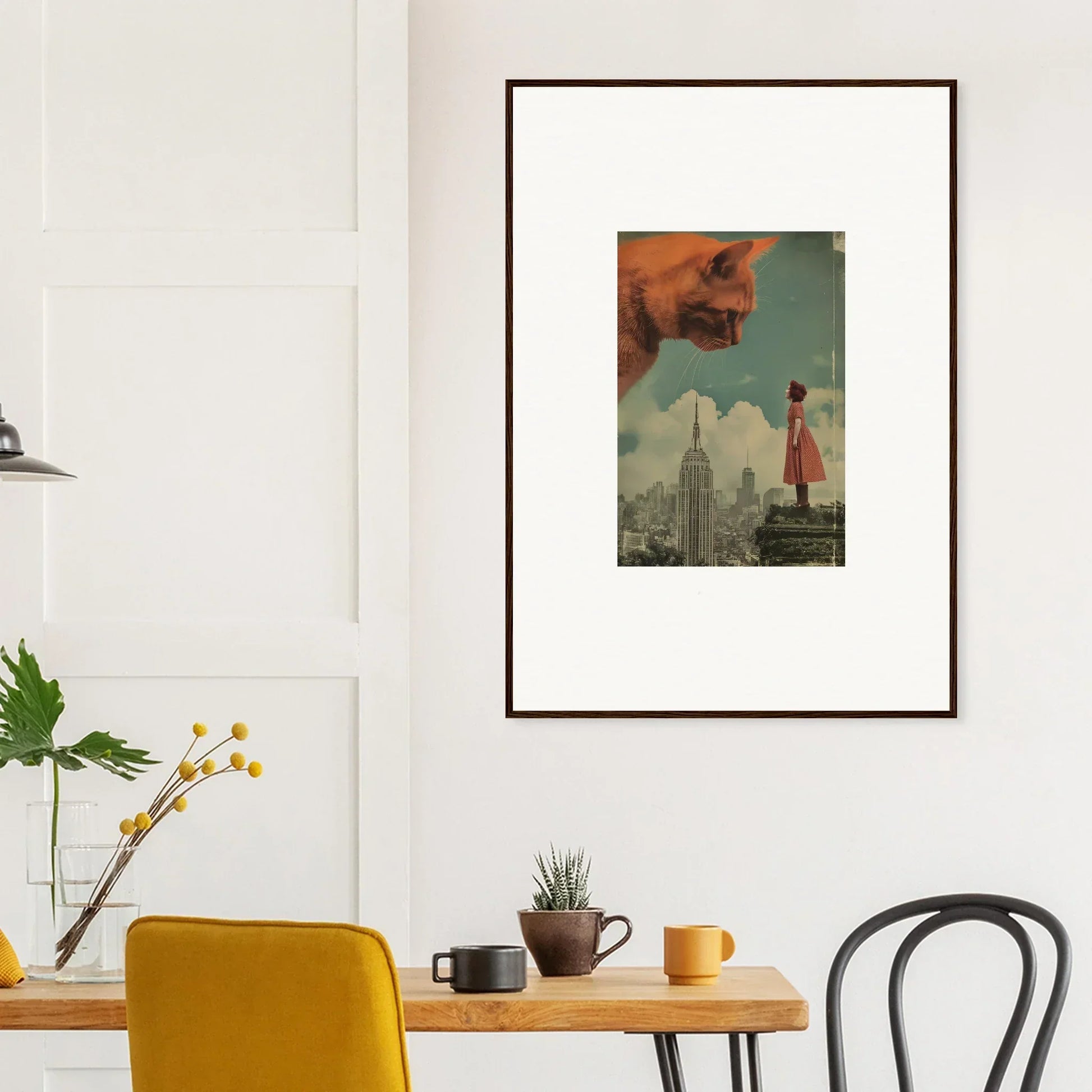 Framed surrealist wall art with a giant cat and figure for whimsical room decor