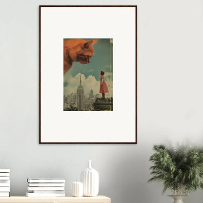 Framed surrealist artwork of a giant cat and person on a skyline for whimsical room decor