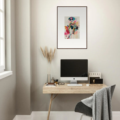 Minimalist wooden desk with computer monitor and Candy Fantasia framed wall art decor