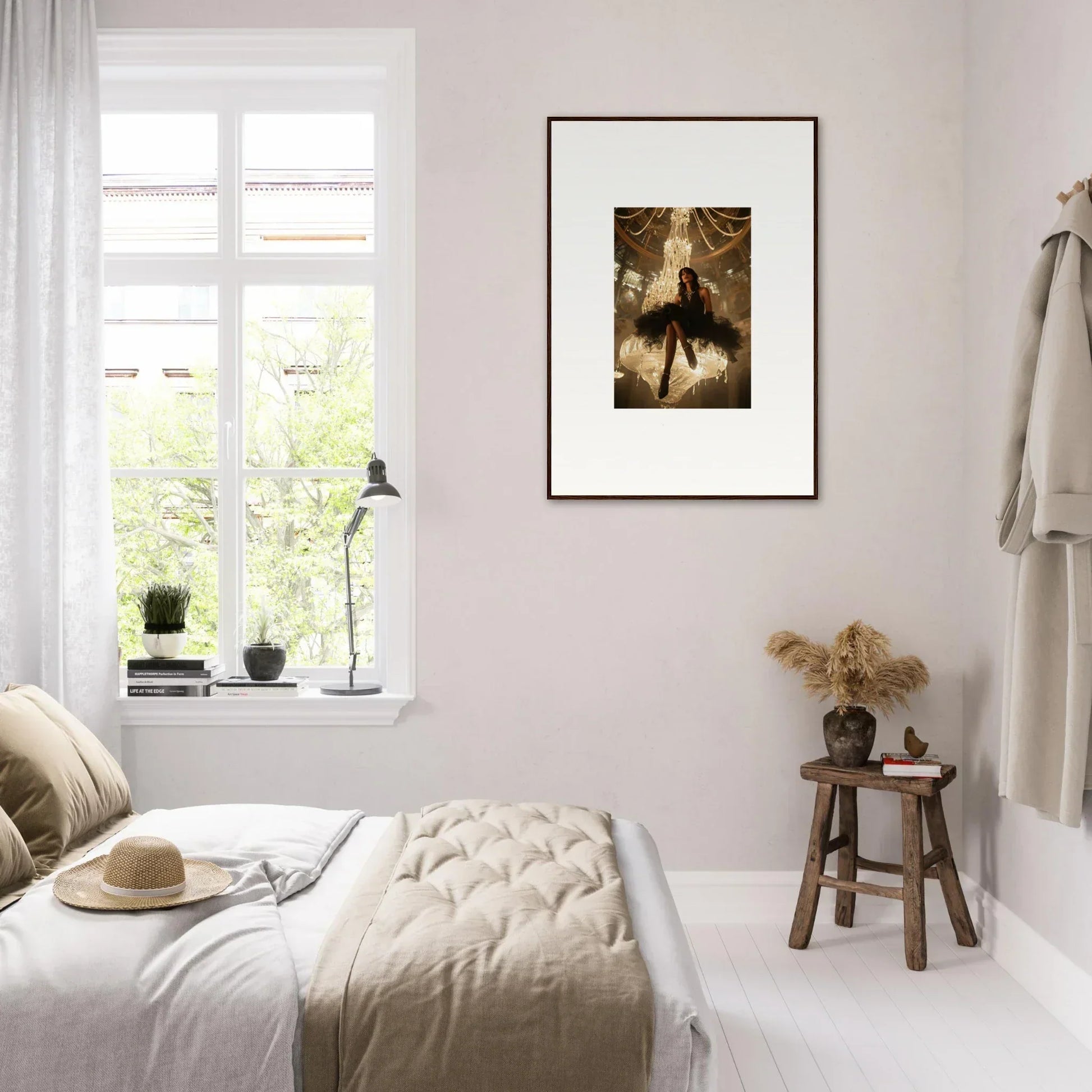 Serene bedroom with neutral tones and framed wall art, enhancing Goddess Ascendant room decor