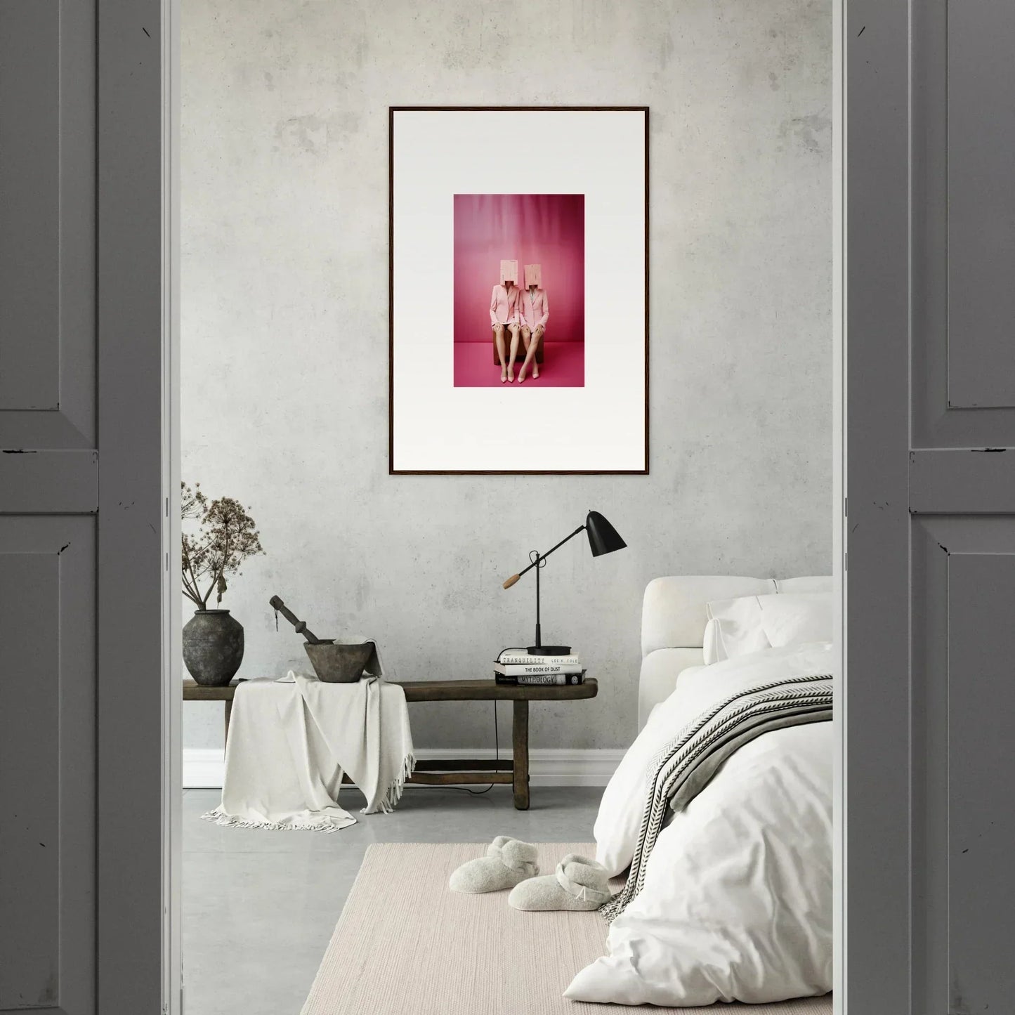 Framed pink-toned wall art featuring two figures, perfect for room decoration