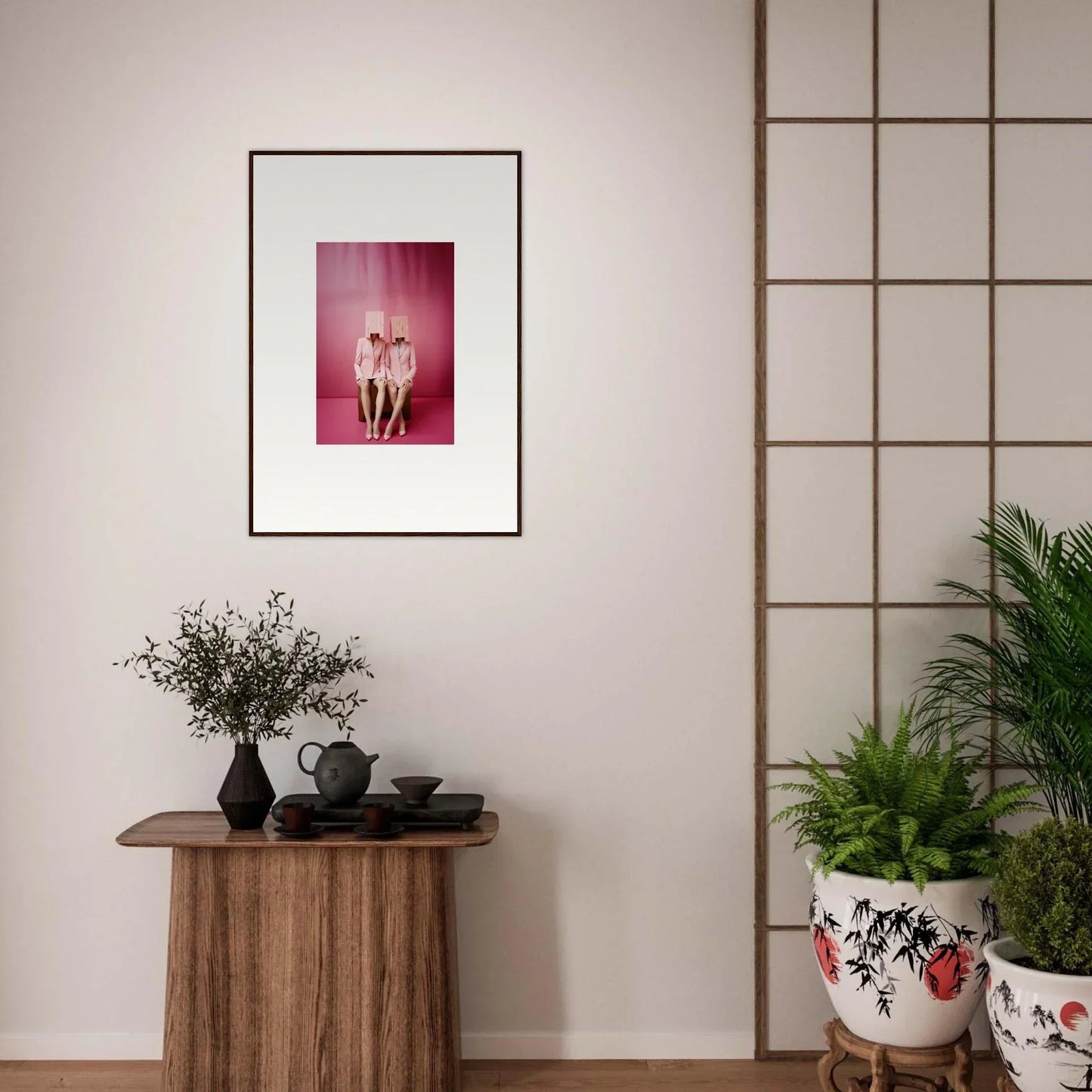 Framed wall art featuring two nude figures on a pink background for stylish room decoration